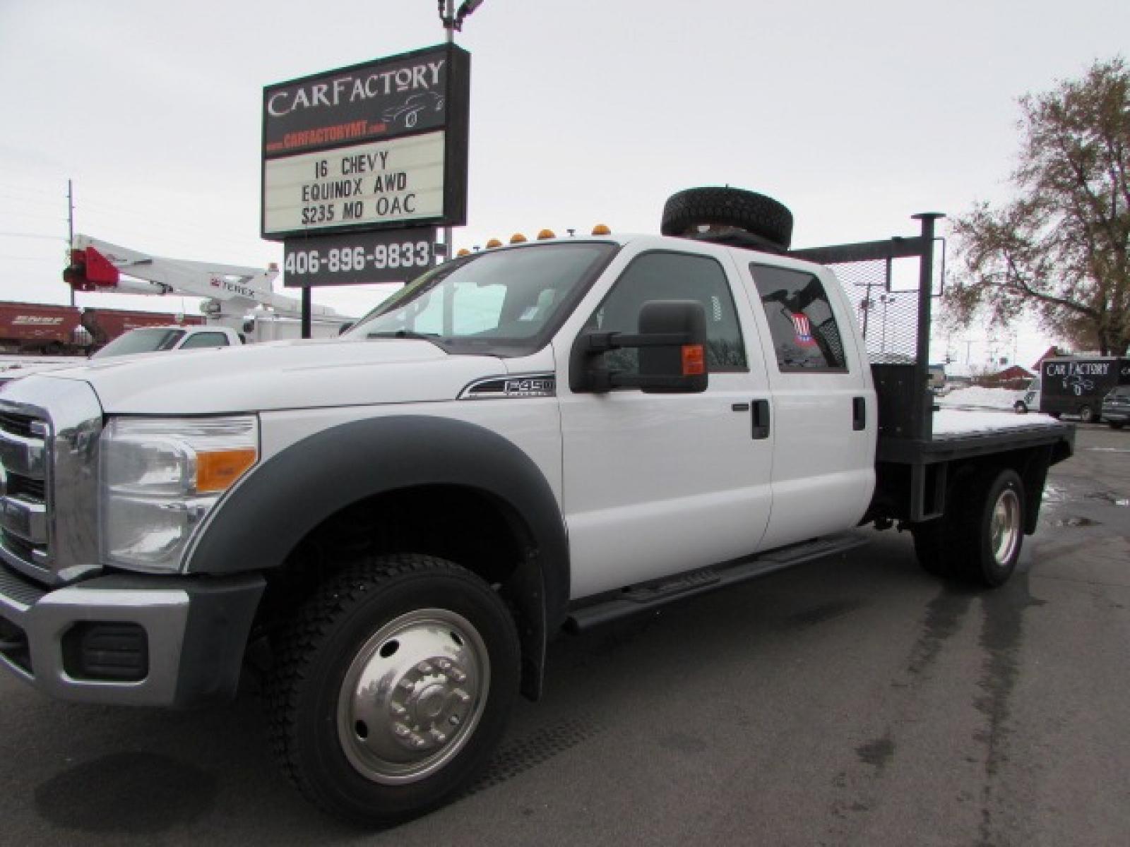 2016 White /Tan Cloth Ford F-450 SD Crew Cab DRW 4WD (1FD0W4HY8GE) with an 6.8L V10 SOHC 30V engine, 5-Speed Automatic transmission, located at 4562 State Avenue, Billings, MT, 59101, (406) 896-9833, 45.769516, -108.526772 - 2016 Ford F-450 SD XLT Crew Cab DRW 4WD Flatbed - 89,041 miles - One owner! 6.8L V10 SOHC 30V Engine - 5-Speed Automatic Transmission - 4WD - Flatbed - Dually - 89,041 miles XLT package - air conditioning - tilt wheel - cruise control - AM-FM-CD bluetooth audio - Microsoft SYNC to pair your d - Photo #0