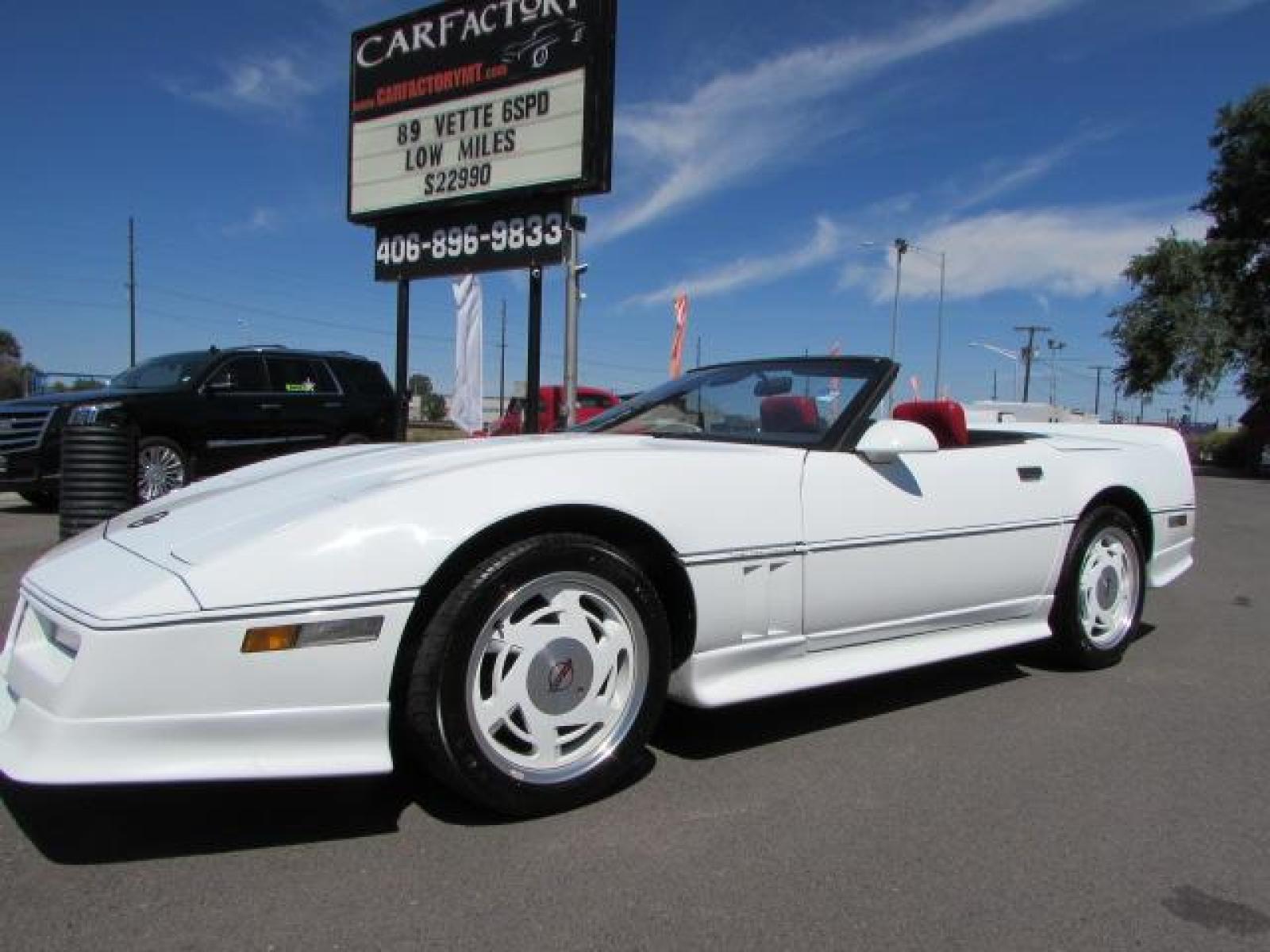 1989 White /Red Leather Chevrolet Corvette Convertible (1G1YY3184K5) with an 5.7L V8 OHV 16V engine, 6 speed manual transmission, located at 4562 State Avenue, Billings, MT, 59101, (406) 896-9833, 45.769516, -108.526772 - 1989 Chevrolet Corvette Convertible 6 speed manual - 13,219 miles!! 5.7L V8 OHV 16V engine - 6 speed manual transmission - 13,219 miles! Air conditioning - tilt and telescoping steering wheel - cruise control - Bose audio system - power windows and door locks - leather interior - dual power se - Photo #0