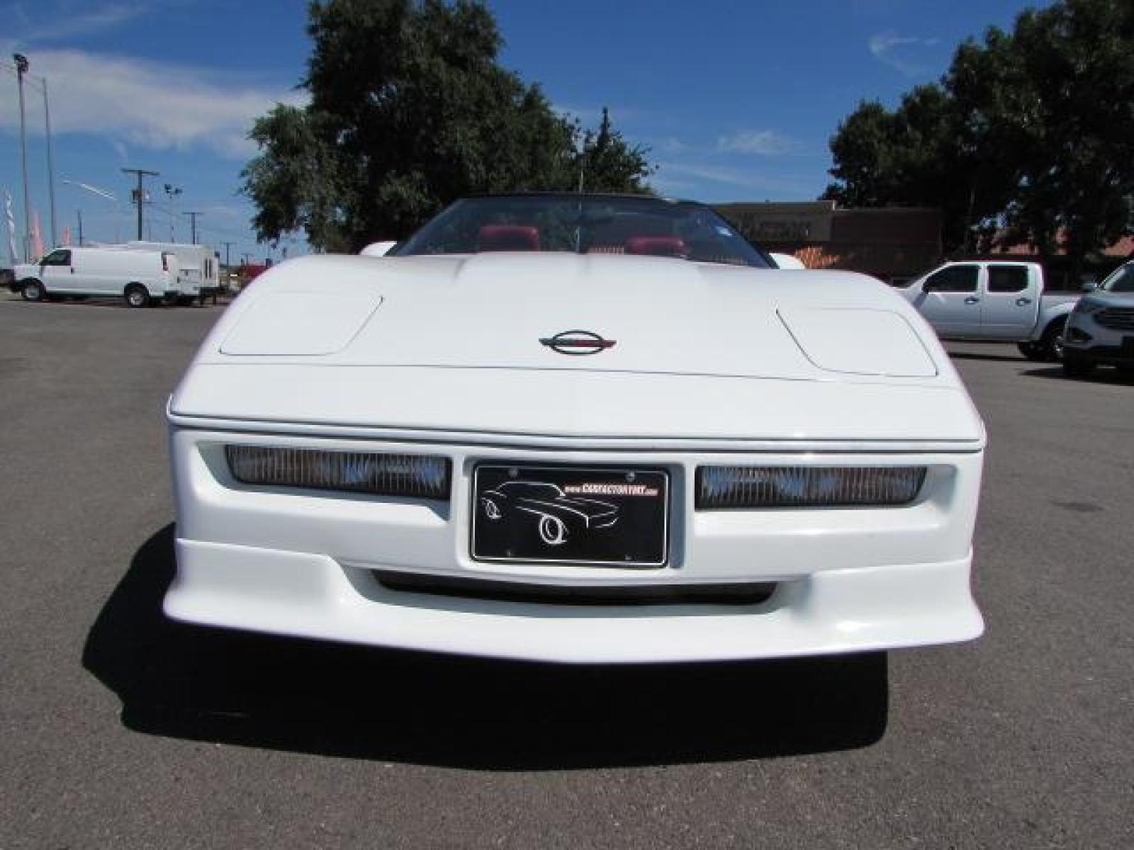 1989 White /Red Leather Chevrolet Corvette Convertible (1G1YY3184K5) with an 5.7L V8 OHV 16V engine, 6 speed manual transmission, located at 4562 State Avenue, Billings, MT, 59101, (406) 896-9833, 45.769516, -108.526772 - 1989 Chevrolet Corvette Convertible 6 speed manual - 13,219 miles!! 5.7L V8 OHV 16V engine - 6 speed manual transmission - 13,219 miles! Air conditioning - tilt and telescoping steering wheel - cruise control - Bose audio system - power windows and door locks - leather interior - dual power se - Photo #11
