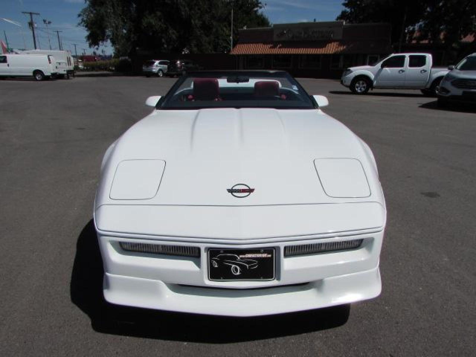 1989 White /Red Leather Chevrolet Corvette Convertible (1G1YY3184K5) with an 5.7L V8 OHV 16V engine, 6 speed manual transmission, located at 4562 State Avenue, Billings, MT, 59101, (406) 896-9833, 45.769516, -108.526772 - 1989 Chevrolet Corvette Convertible 6 speed manual - 13,219 miles!! 5.7L V8 OHV 16V engine - 6 speed manual transmission - 13,219 miles! Air conditioning - tilt and telescoping steering wheel - cruise control - Bose audio system - power windows and door locks - leather interior - dual power se - Photo #12