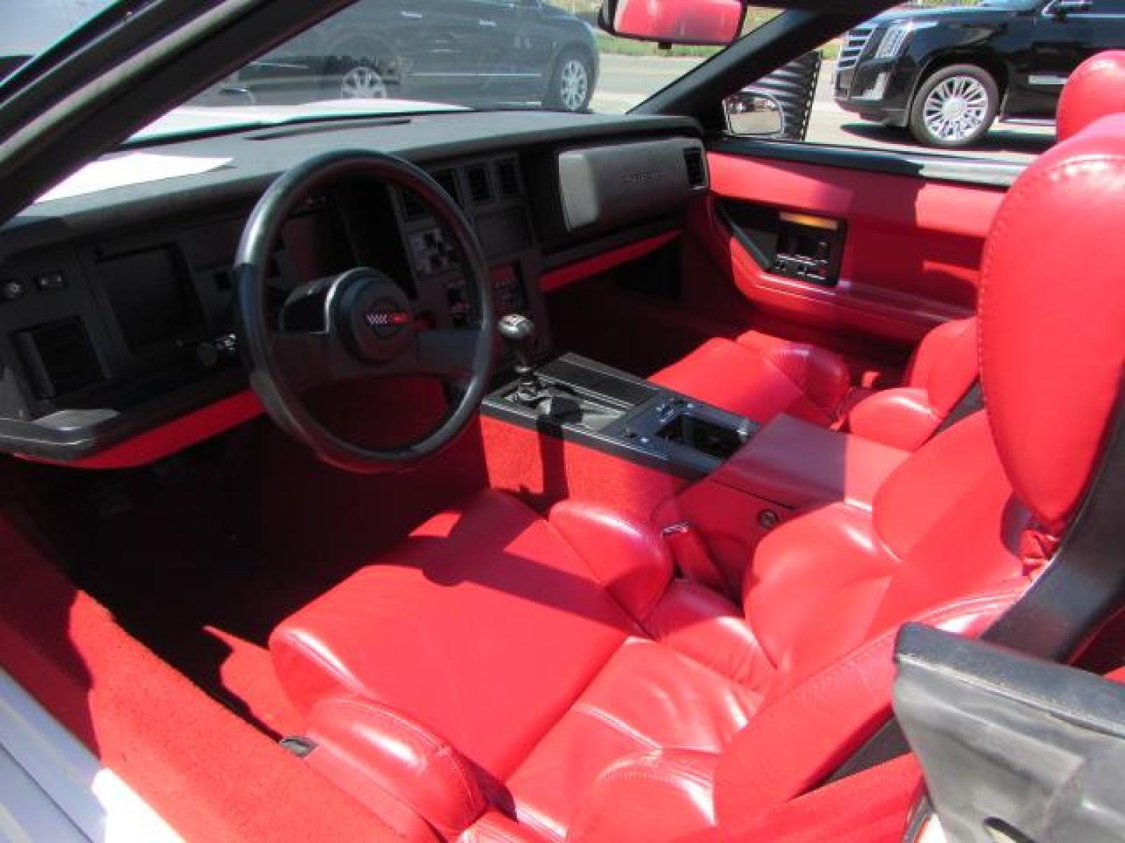 1989 White /Red Leather Chevrolet Corvette Convertible (1G1YY3184K5) with an 5.7L V8 OHV 16V engine, 6 speed manual transmission, located at 4562 State Avenue, Billings, MT, 59101, (406) 896-9833, 45.769516, -108.526772 - 1989 Chevrolet Corvette Convertible 6 speed manual - 13,219 miles!! 5.7L V8 OHV 16V engine - 6 speed manual transmission - 13,219 miles! Air conditioning - tilt and telescoping steering wheel - cruise control - Bose audio system - power windows and door locks - leather interior - dual power se - Photo #15