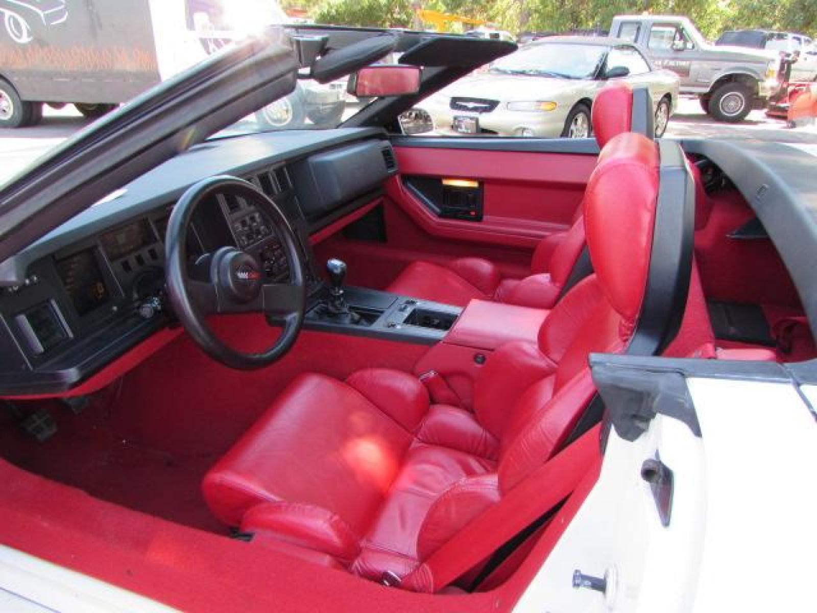 1989 White /Red Leather Chevrolet Corvette Convertible (1G1YY3184K5) with an 5.7L V8 OHV 16V engine, 6 speed manual transmission, located at 4562 State Avenue, Billings, MT, 59101, (406) 896-9833, 45.769516, -108.526772 - 1989 Chevrolet Corvette Convertible 6 speed manual - 13,219 miles!! 5.7L V8 OHV 16V engine - 6 speed manual transmission - 13,219 miles! Air conditioning - tilt and telescoping steering wheel - cruise control - Bose audio system - power windows and door locks - leather interior - dual power se - Photo #28