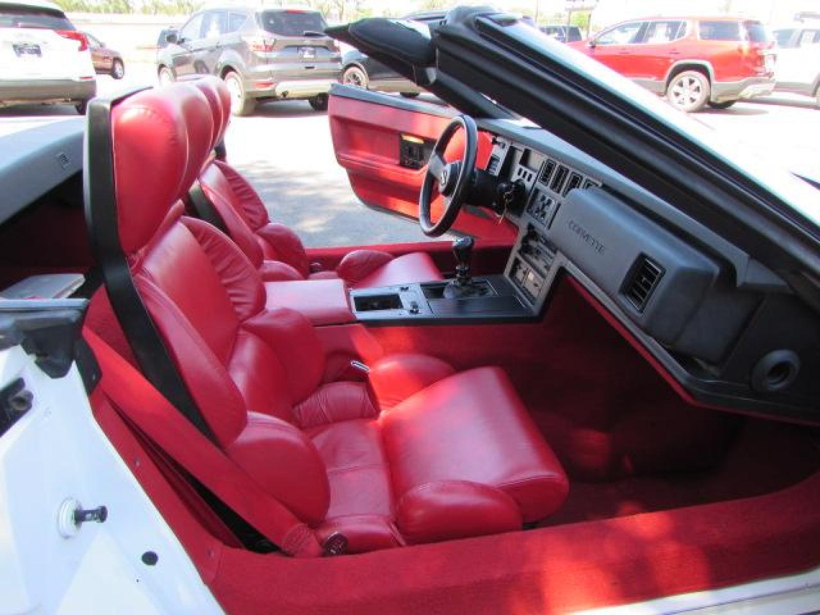 1989 White /Red Leather Chevrolet Corvette Convertible (1G1YY3184K5) with an 5.7L V8 OHV 16V engine, 6 speed manual transmission, located at 4562 State Avenue, Billings, MT, 59101, (406) 896-9833, 45.769516, -108.526772 - 1989 Chevrolet Corvette Convertible 6 speed manual - 13,219 miles!! 5.7L V8 OHV 16V engine - 6 speed manual transmission - 13,219 miles! Air conditioning - tilt and telescoping steering wheel - cruise control - Bose audio system - power windows and door locks - leather interior - dual power se - Photo #30