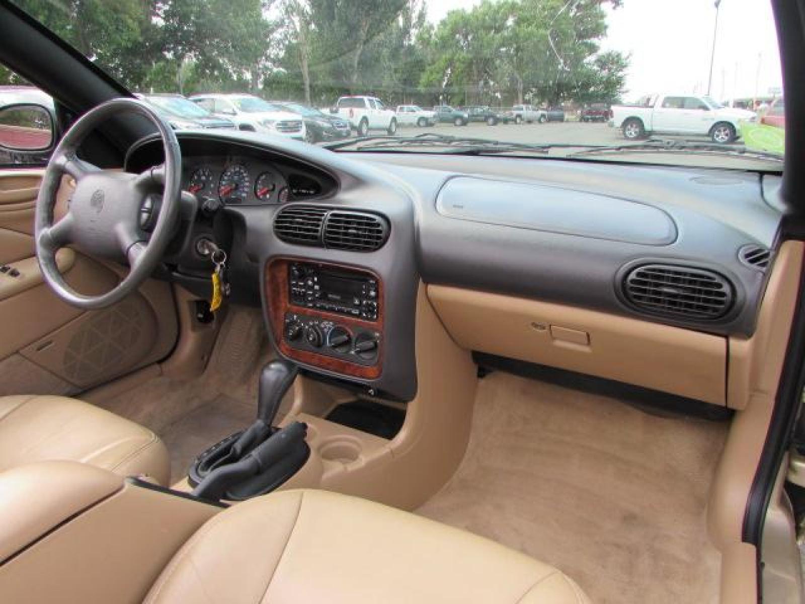 1999 Gold /Tan Leather Chrysler Sebring JXi (3C3EL55H6XT) with an 2.5L V6 SOHC 24V engine, 4-Speed Automatic Overdrive transmission, located at 4562 State Avenue, Billings, MT, 59101, (406) 896-9833, 45.769516, -108.526772 - 1999 Chrysler Sebring JXi Convertible 2.5L V6 SOHC 24V engine - 4-Speed Automatic Overdrive transmission - 73014 miles JXi package - air conditioning - tilt steering wheel - AM-FM-CD audio - power windows and door locks - power seat - leather interior - keyless entry - alloy wheels Runs an - Photo #12