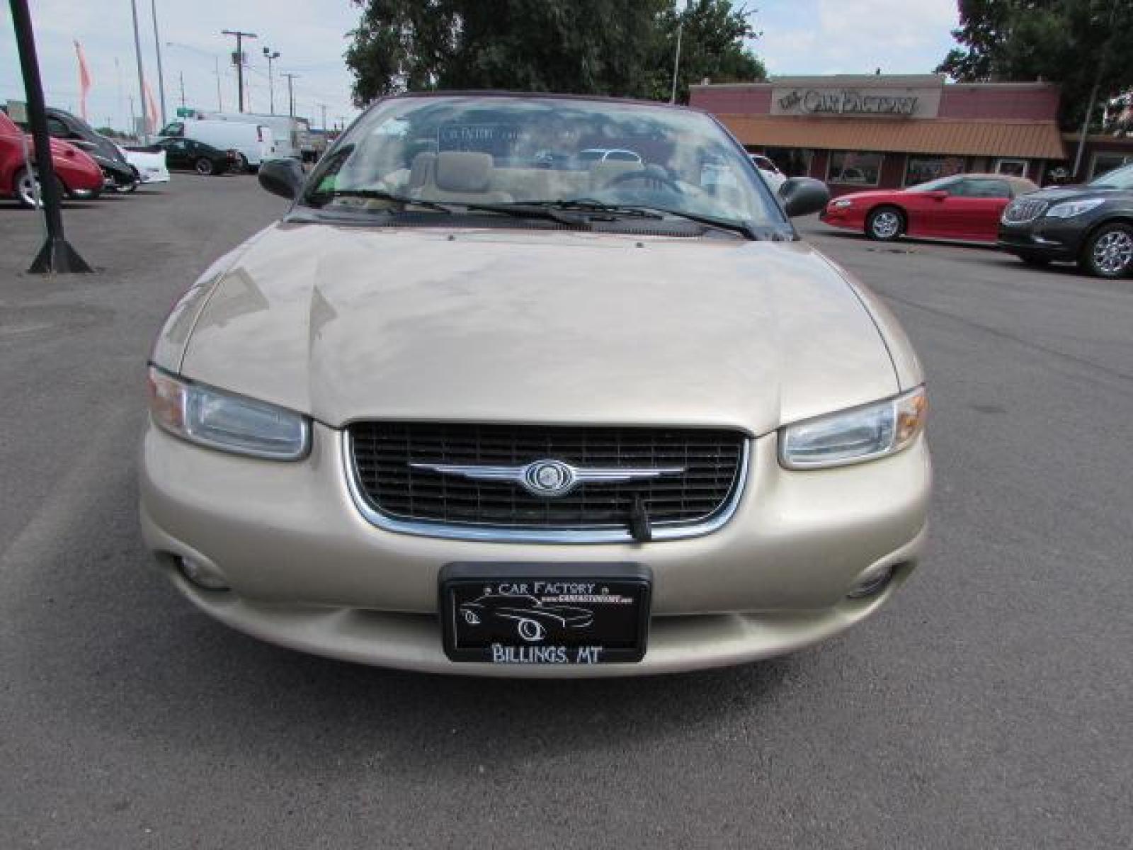 1999 Gold /Tan Leather Chrysler Sebring JXi (3C3EL55H6XT) with an 2.5L V6 SOHC 24V engine, 4-Speed Automatic Overdrive transmission, located at 4562 State Avenue, Billings, MT, 59101, (406) 896-9833, 45.769516, -108.526772 - 1999 Chrysler Sebring JXi Convertible 2.5L V6 SOHC 24V engine - 4-Speed Automatic Overdrive transmission - 73014 miles JXi package - air conditioning - tilt steering wheel - AM-FM-CD audio - power windows and door locks - power seat - leather interior - keyless entry - alloy wheels Runs an - Photo #6