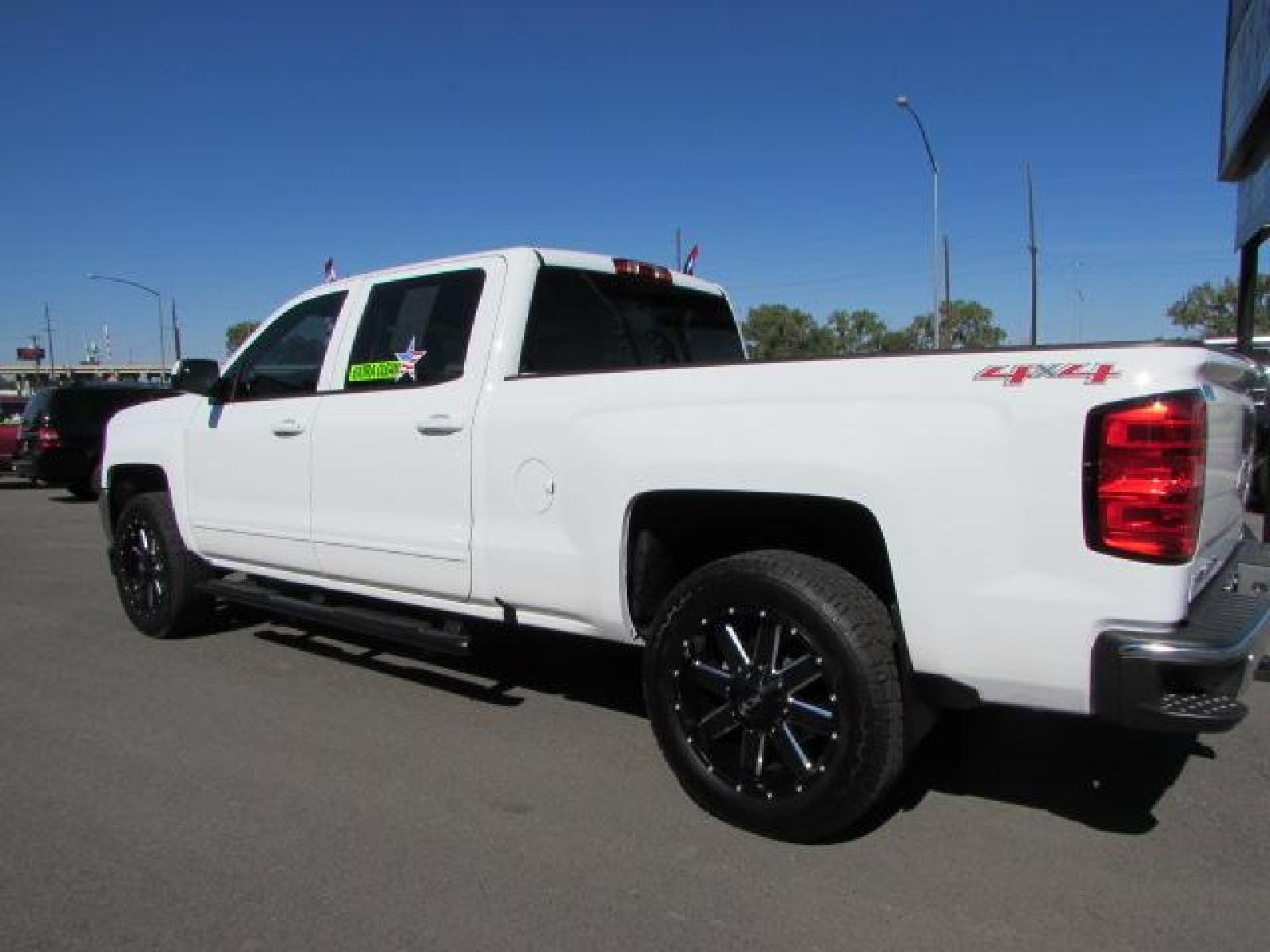 2017 White /Gray Cloth Chevrolet Silverado 1500 LT Crew Cab 4WD (1GCUKREC1HF) with an 5.3L V8 OHV 16V engine, 6A transmission, located at 4562 State Avenue, Billings, MT, 59101, (406) 896-9833, 45.769516, -108.526772 - 2017 Chevrolet Silverado 1500 LT Crew Cab 4WD - Extra clean! 5.3L V8 OHV 16V engine - 6 speed automatic transmission - 6.5 box - 119,676 miles $426 per month - Payment estimate based on $1000 cash or trade down - 84 months at 3.99 percent APR - on approved credit LT package - air condition - Photo #1