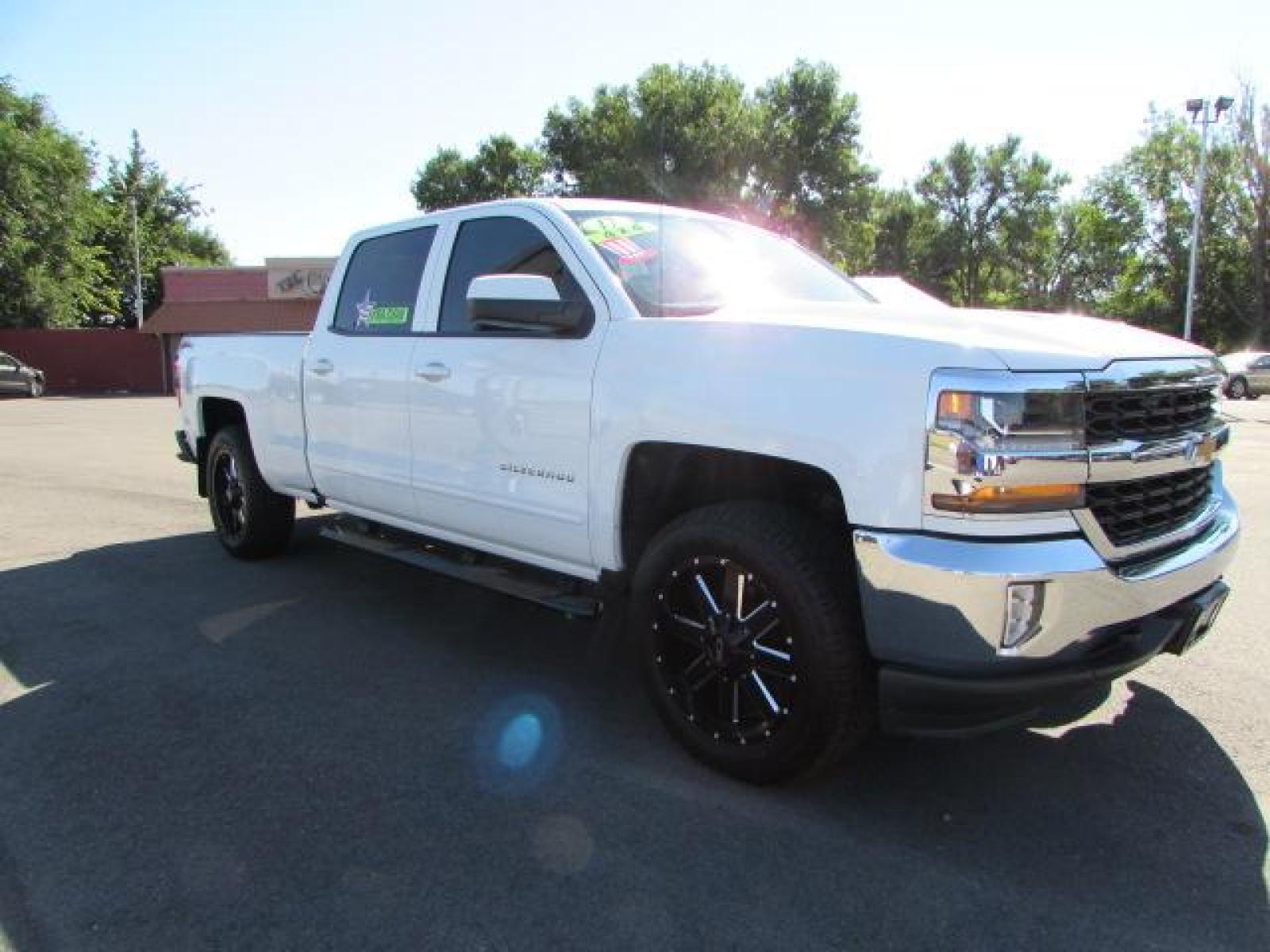2017 White /Gray Cloth Chevrolet Silverado 1500 LT Crew Cab 4WD (1GCUKREC1HF) with an 5.3L V8 OHV 16V engine, 6A transmission, located at 4562 State Avenue, Billings, MT, 59101, (406) 896-9833, 45.769516, -108.526772 - Photo #4