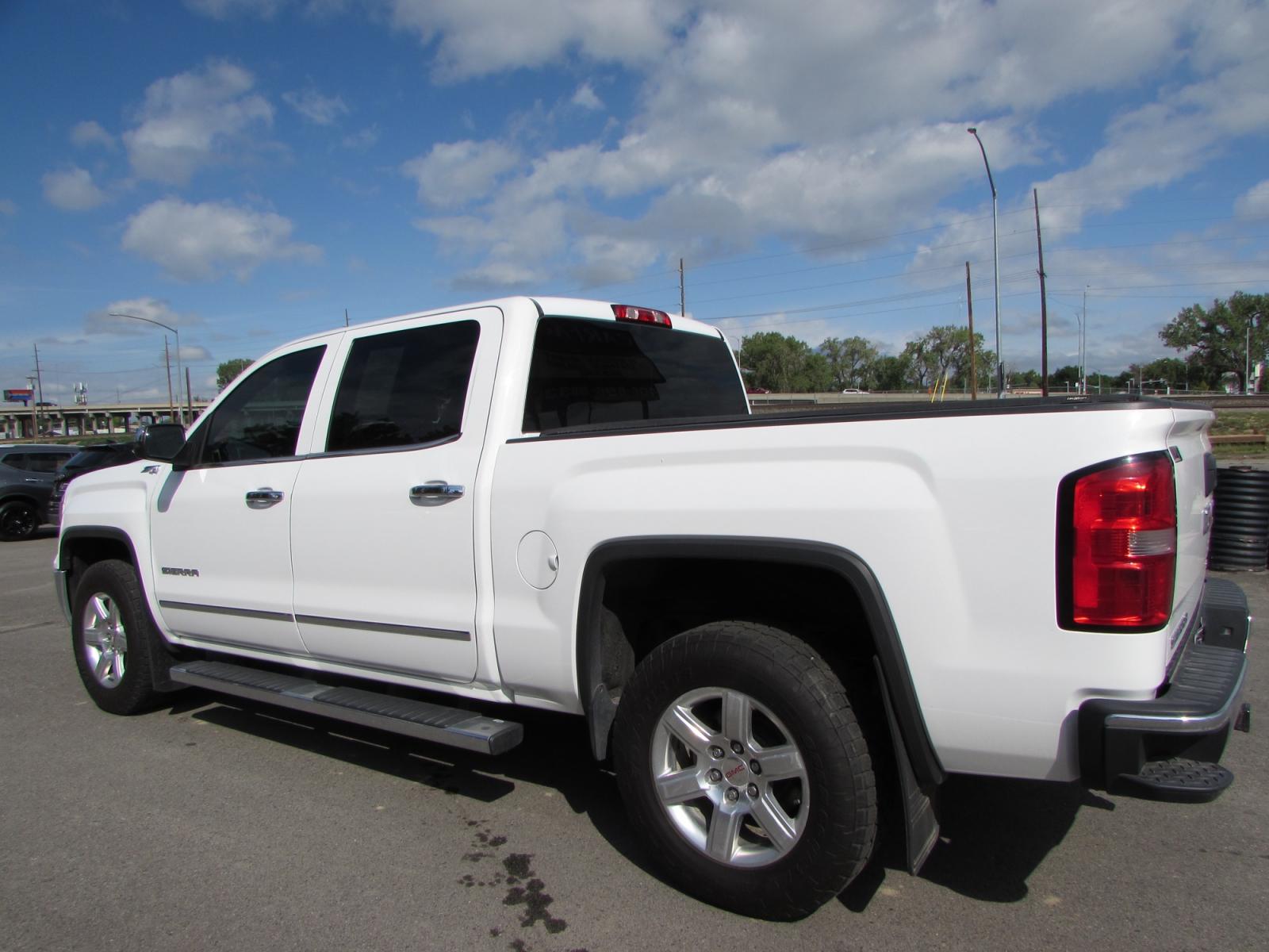 2014 White /Gray leather GMC Sierra 1500 SLT Crew Cab 4WD (3GTU2VEC6EG) with an 5.3L V8 OHV 16V engine, 6-Speed Automatic transmission, located at 4562 State Avenue, Billings, MT, 59101, (406) 896-9833, 45.769516, -108.526772 - 2014 GMC Sierra 1500 SLT Z71 Crew Cab 4WD - Extra clean! 5.3L V8 OHV 16V Direct Injection engine - 6 speed automatic transmission - 4WD - 174,862 miles - 94 point inspection Inspected and serviced - copies of inspection and work performed as well as complete vehicle history report provided! - Photo #1