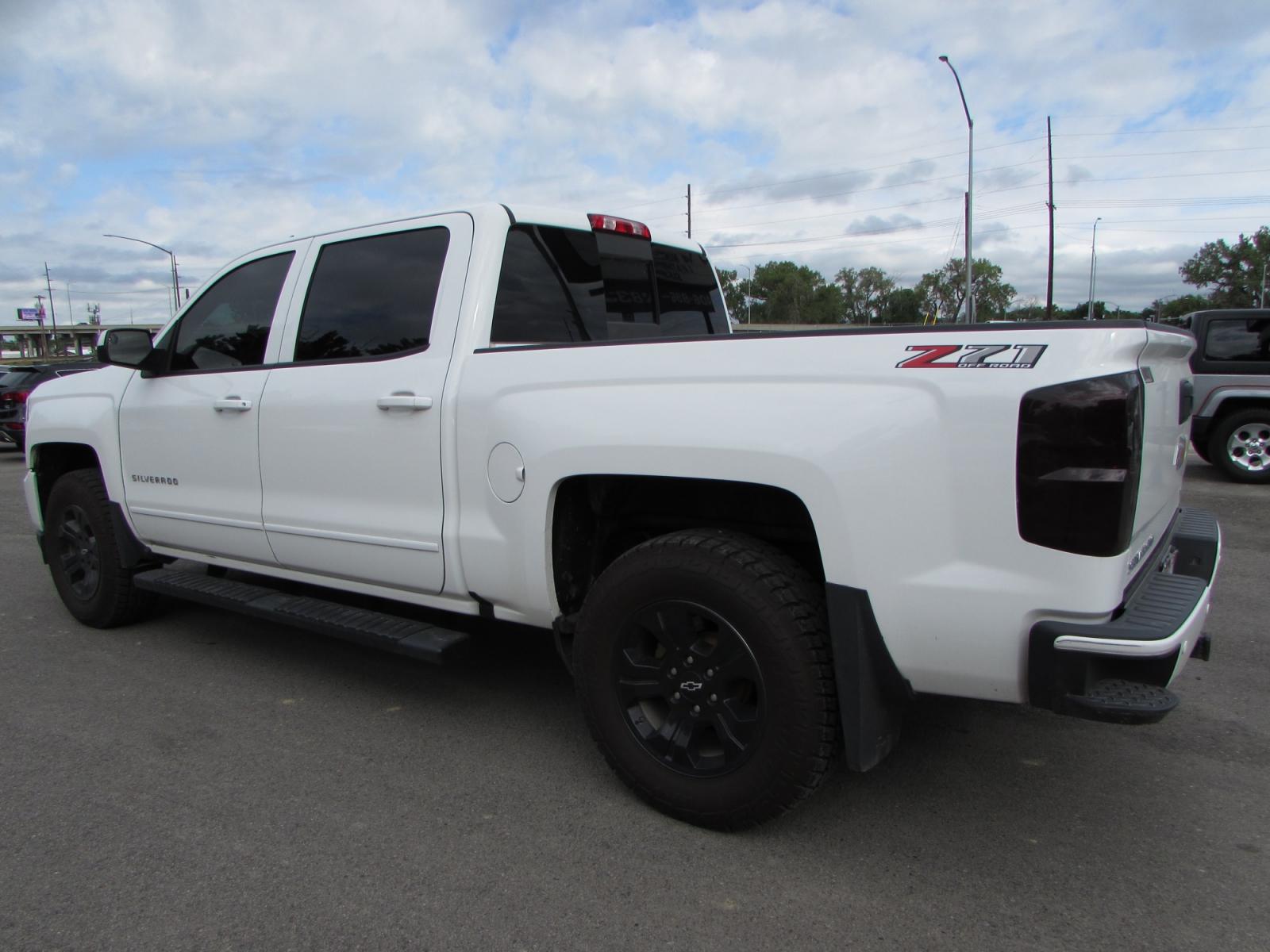 2018 White /Gray Cloth Chevrolet Silverado 1500 LT Z71Crew Cab 4WD (3GCUKRECXJG) with an 5.3L V8 OHV 16V engine, 6A transmission, located at 4562 State Avenue, Billings, MT, 59101, (406) 896-9833, 45.769516, -108.526772 - 2018 Chevrolet Silverado 1500 LT Z71 Crew Cab 4WD - One owner! 5.3L V8 OHV 16V Ecotec3 engine - 6 speed automatic transmission with tow /haul - Z71 Offroad Edition - One Owner - 115,247 miles 94 point Inspected and serviced - copy of inspection and work performed as well as full vehicle histor - Photo #1