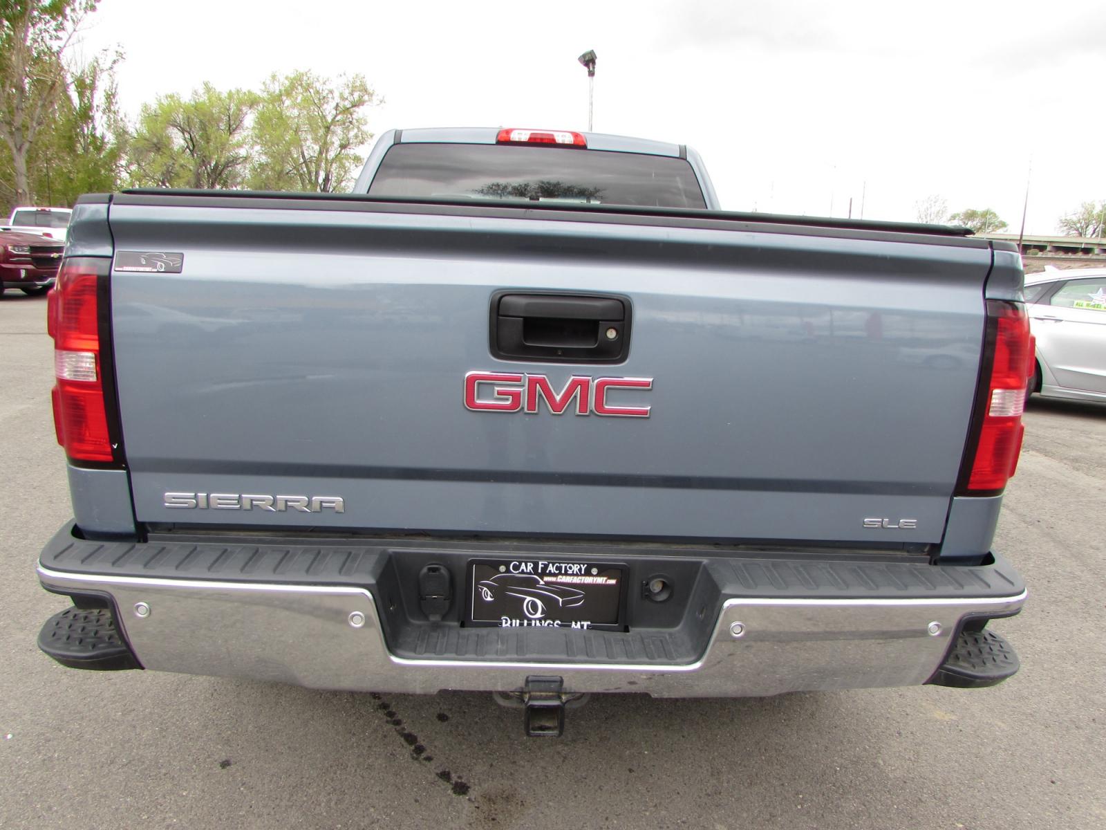2016 Gray /Gray Cloth GMC Sierra 1500 SLE Double Cab 4WD (1GTV2MEC1GZ) with an 5.3L V8 OHV 16V engine, 6A transmission, located at 4562 State Avenue, Billings, MT, 59101, (406) 896-9833, 45.769516, -108.526772 - 2016 GMC Sierra 1500 SLE Double Cab Z71 4WD - Montana unit! 5.3L V8 OHV 16V engine - 6 speed automatic transmission - 4WD - 97,921 miles - 94 point inspection! SLE package - air conditioning - tilt steering wheel - cruise control - touchscreen bluetooth audio with Mylink to pair your devices a - Photo #2
