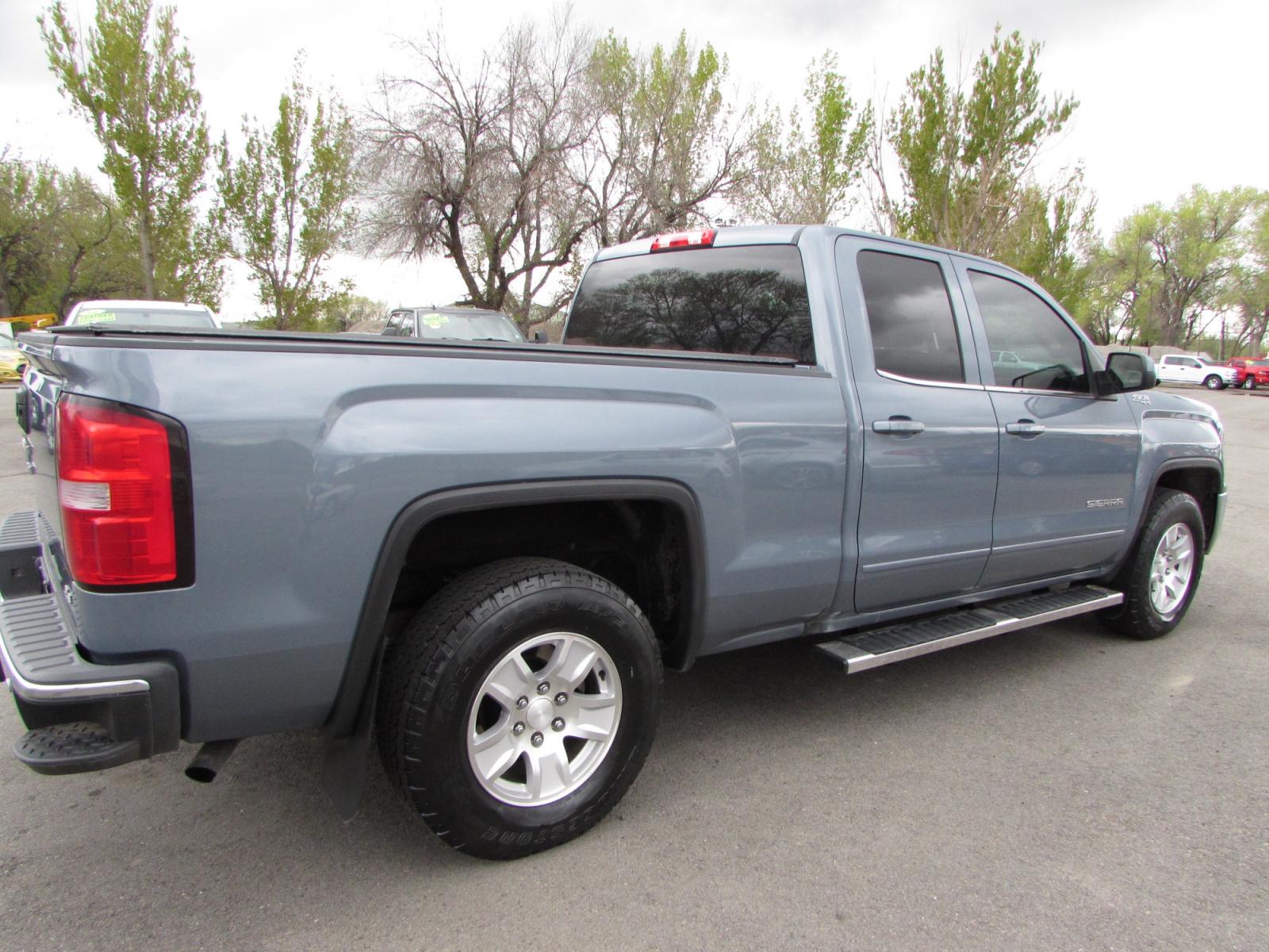 2016 Gray /Gray Cloth GMC Sierra 1500 SLE Double Cab 4WD (1GTV2MEC1GZ) with an 5.3L V8 OHV 16V engine, 6A transmission, located at 4562 State Avenue, Billings, MT, 59101, (406) 896-9833, 45.769516, -108.526772 - 2016 GMC Sierra 1500 SLE Double Cab Z71 4WD - Montana unit! 5.3L V8 OHV 16V engine - 6 speed automatic transmission - 4WD - 97,921 miles - 94 point inspection! SLE package - air conditioning - tilt steering wheel - cruise control - touchscreen bluetooth audio with Mylink to pair your devices a - Photo #3