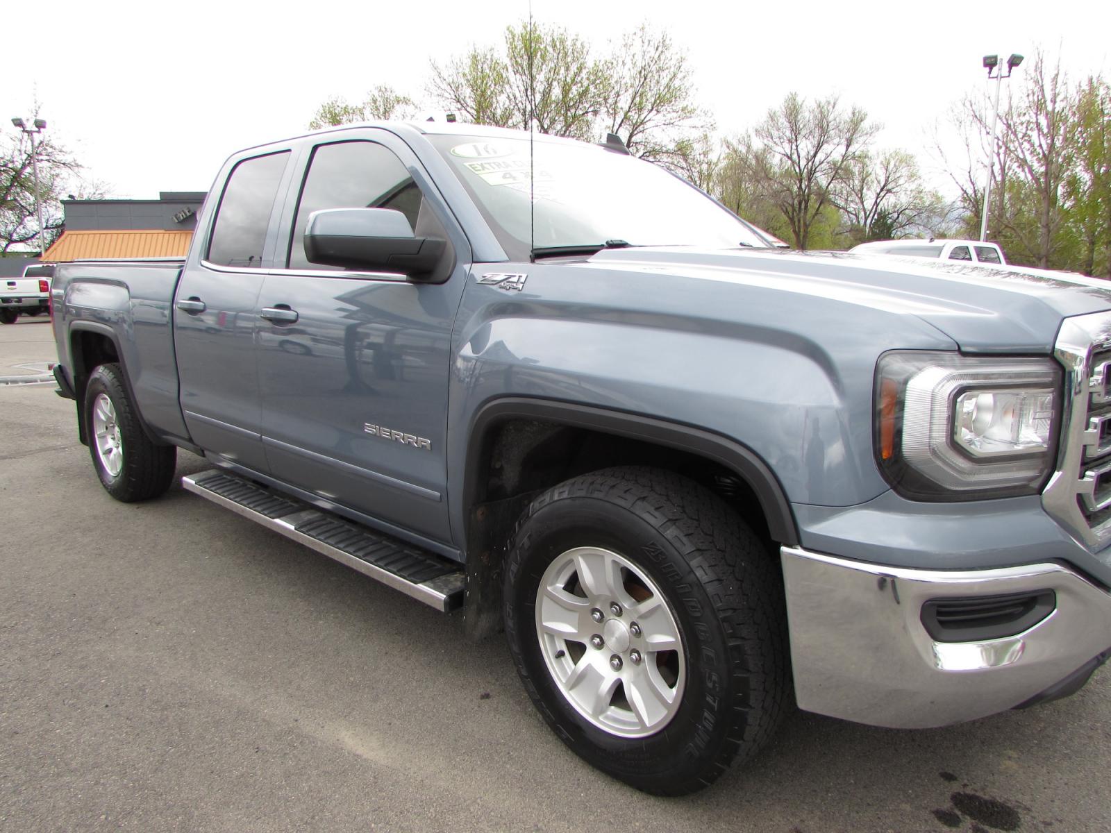 2016 Gray /Gray Cloth GMC Sierra 1500 SLE Double Cab 4WD (1GTV2MEC1GZ) with an 5.3L V8 OHV 16V engine, 6A transmission, located at 4562 State Avenue, Billings, MT, 59101, (406) 896-9833, 45.769516, -108.526772 - 2016 GMC Sierra 1500 SLE Double Cab Z71 4WD - Montana unit! 5.3L V8 OHV 16V engine - 6 speed automatic transmission - 4WD - 97,921 miles - 94 point inspection! SLE package - air conditioning - tilt steering wheel - cruise control - touchscreen bluetooth audio with Mylink to pair your devices a - Photo #4