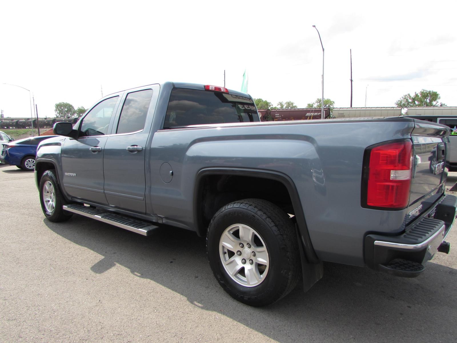 2016 Gray /Gray Cloth GMC Sierra 1500 SLE Double Cab 4WD (1GTV2MEC1GZ) with an 5.3L V8 OHV 16V engine, 6A transmission, located at 4562 State Avenue, Billings, MT, 59101, (406) 896-9833, 45.769516, -108.526772 - 2016 GMC Sierra 1500 SLE Double Cab Z71 4WD - Montana unit! 5.3L V8 OHV 16V engine - 6 speed automatic transmission - 4WD - 97,921 miles - 94 point inspection! SLE package - air conditioning - tilt steering wheel - cruise control - touchscreen bluetooth audio with Mylink to pair your devices a - Photo #1