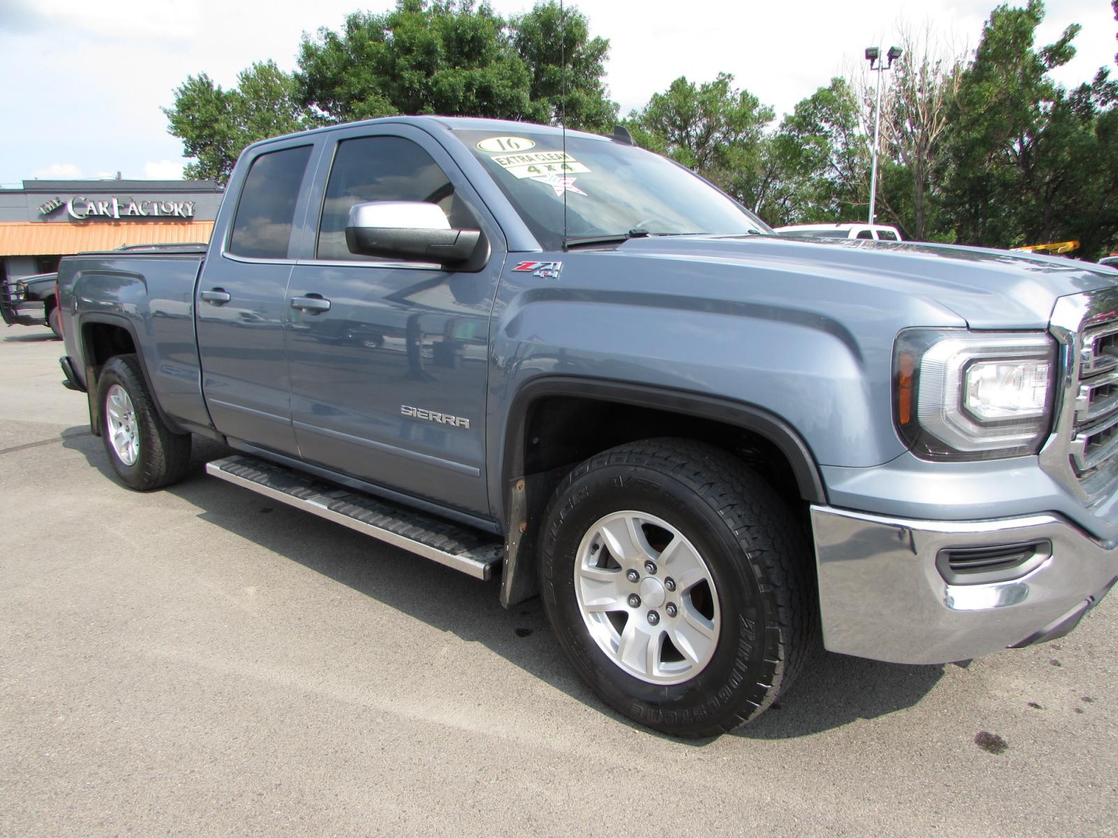 2016 Gray /Gray Cloth GMC Sierra 1500 SLE Double Cab 4WD (1GTV2MEC1GZ) with an 5.3L V8 OHV 16V engine, 6A transmission, located at 4562 State Avenue, Billings, MT, 59101, (406) 896-9833, 45.769516, -108.526772 - 2016 GMC Sierra 1500 SLE Double Cab Z71 4WD - Montana unit! 5.3L V8 OHV 16V engine - 6 speed automatic transmission - 4WD - 97,921 miles - 94 point inspection! SLE package - air conditioning - tilt steering wheel - cruise control - touchscreen bluetooth audio with Mylink to pair your devices a - Photo #4