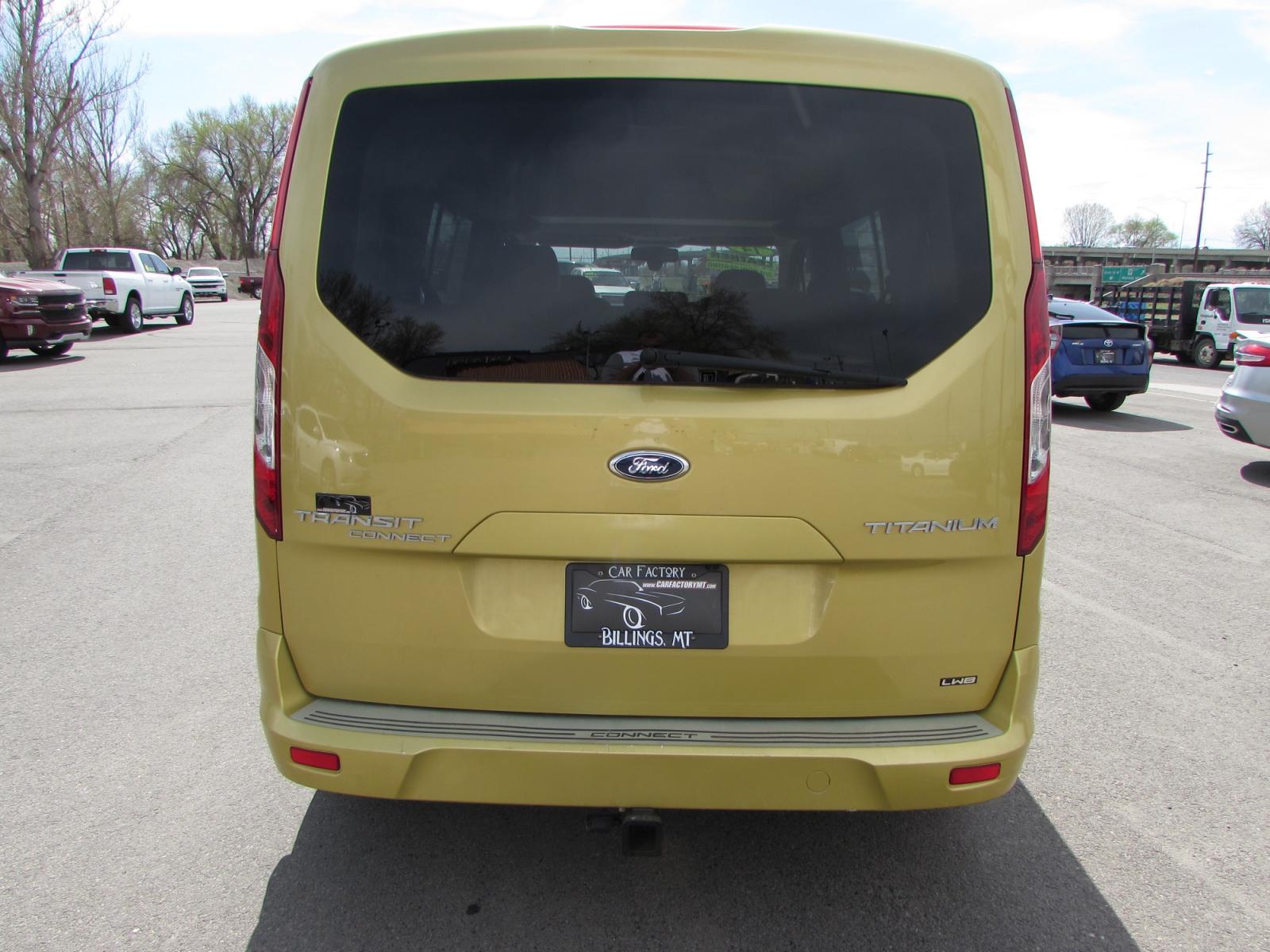 2014 Gold /Gray leather Ford Transit Connect Wagon Titanium w/Rear Liftgate LWB (NM0GE9G73E1) with an 2.5L L4 DOHC 16V engine, 6-Speed Automatic transmission, located at 4562 State Avenue, Billings, MT, 59101, (406) 896-9833, 45.769516, -108.526772 - 2014 Ford Transit Connect Wagon Titanium w/Rear Liftgate LWB - 7 passenger! 2.5L L4 DOHC 16V Engine - 6 speed automatic transmission with overdrive - front wheel drive - 90,290 miles Titanium package - air conditioning - tilt and telescoping steering wheel - cruise control - bluetooth audio w - Photo #2