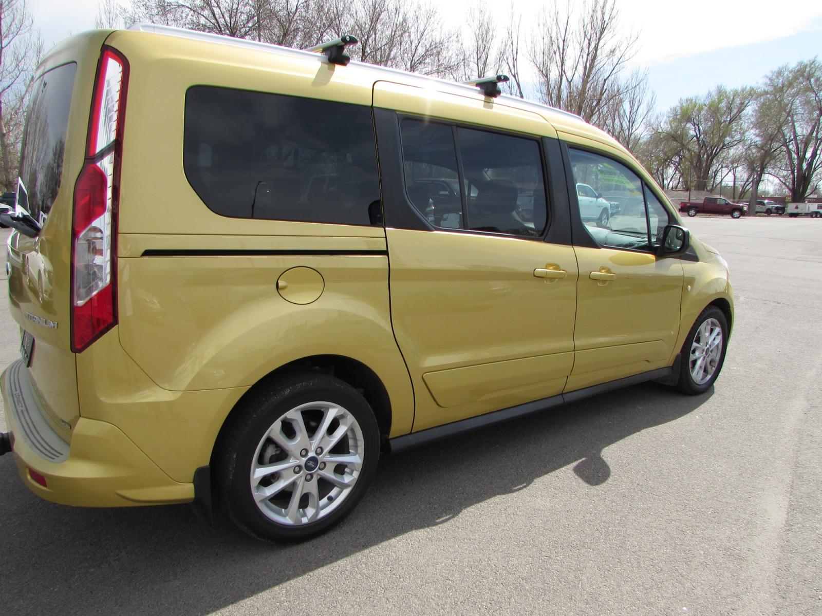 2014 Gold /Gray leather Ford Transit Connect Wagon Titanium w/Rear Liftgate LWB (NM0GE9G73E1) with an 2.5L L4 DOHC 16V engine, 6-Speed Automatic transmission, located at 4562 State Avenue, Billings, MT, 59101, (406) 896-9833, 45.769516, -108.526772 - 2014 Ford Transit Connect Wagon Titanium w/Rear Liftgate LWB - 7 passenger! 2.5L L4 DOHC 16V Engine - 6 speed automatic transmission with overdrive - front wheel drive - 90,290 miles Titanium package - air conditioning - tilt and telescoping steering wheel - cruise control - bluetooth audio w - Photo #3