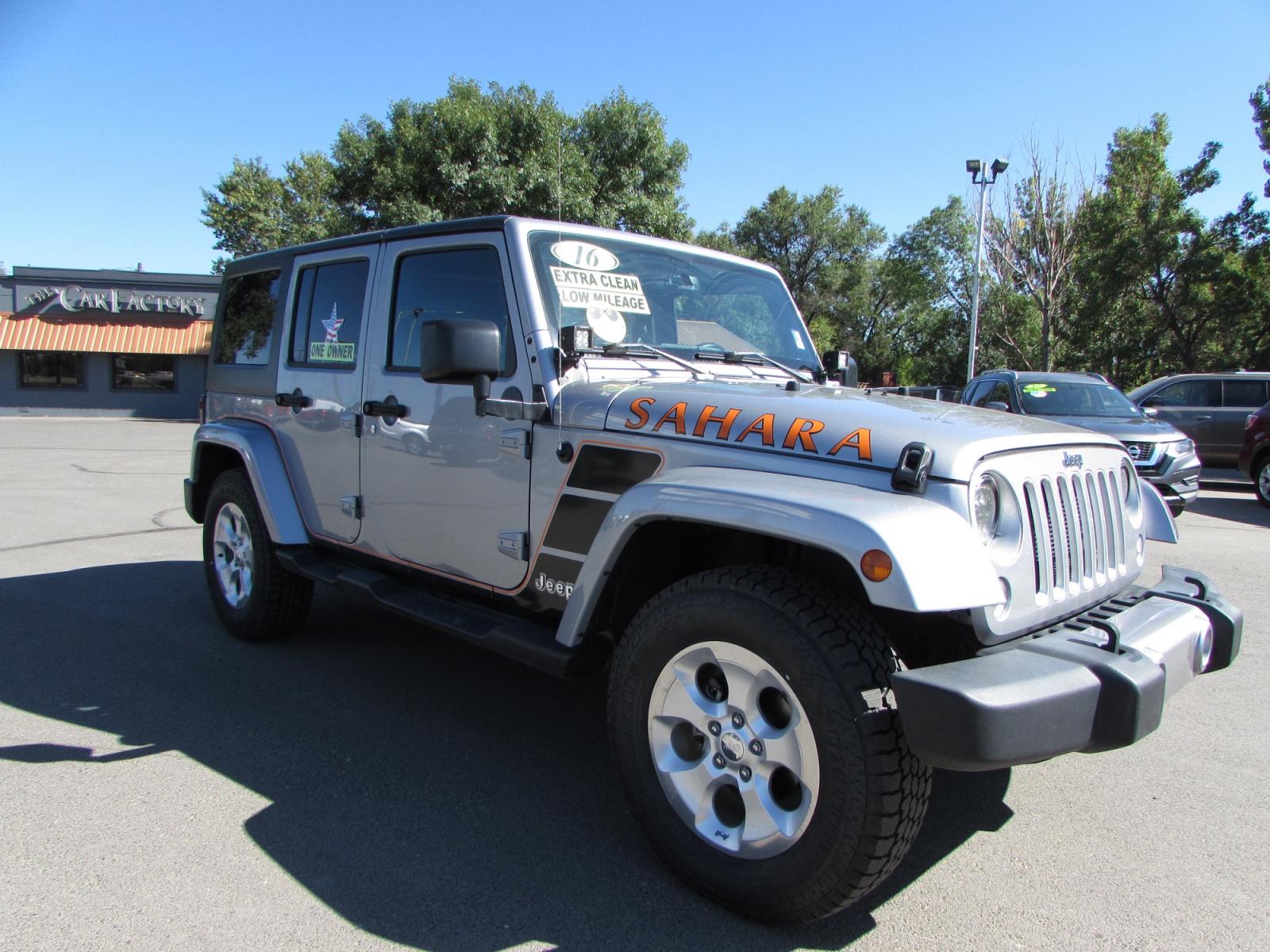 2016 /Gray Leather Jeep Wrangler Unlimited Sahara 4WD (1C4BJWEGXGL) with an 3.6L V6 DOHC 24V FFV engine, Automatic transmission, located at 4562 State Avenue, Billings, MT, 59101, (406) 896-9833, 45.769516, -108.526772 - 2016 Jeep Wrangler Unlimited Sahara 4WD - One owner - Low miles! 3.6L V6 DOHC 24V FFV Engine - automatic transmission - 4WD - 84,933 miles Sahara Package - Hardtop and Sunrider soft top - automatic climate control - tilt steering wheel - cruise control - Alpine premium audio with 9 speakers a - Photo #4