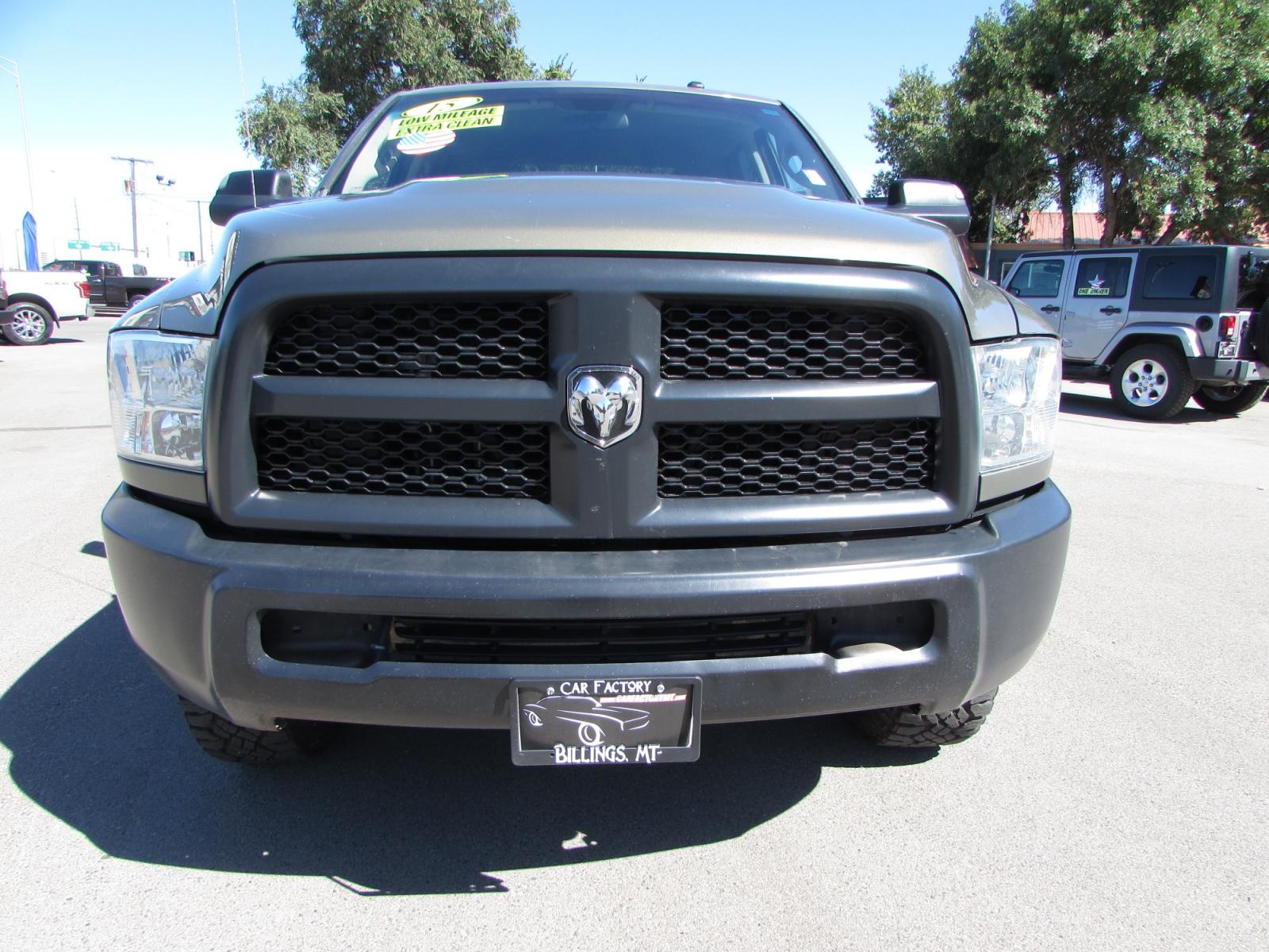 2015 Prairie Pearl /Gray RAM 3500 Tradesman Crew Cab 4WD (3C63R3GT6FG) with an 5.7L V8 OHV 16V engine, 6-Speed Automatic transmission, located at 4562 State Avenue, Billings, MT, 59101, (406) 896-9833, 45.769516, -108.526772 - 2015 RAM 3500 Tradesman Crew Cab 4WD - One owner - 63,672 miles! 5.7L V8 OHV 16V Hemi Engine - 6 speed automatic transmission - Longbox - 4WD - 63,672 miles - One owner Tradesman package - air conditioning - tilt steering wheel - cruise control - AM/FM/XM/CD audio - power windows and door loc - Photo #5
