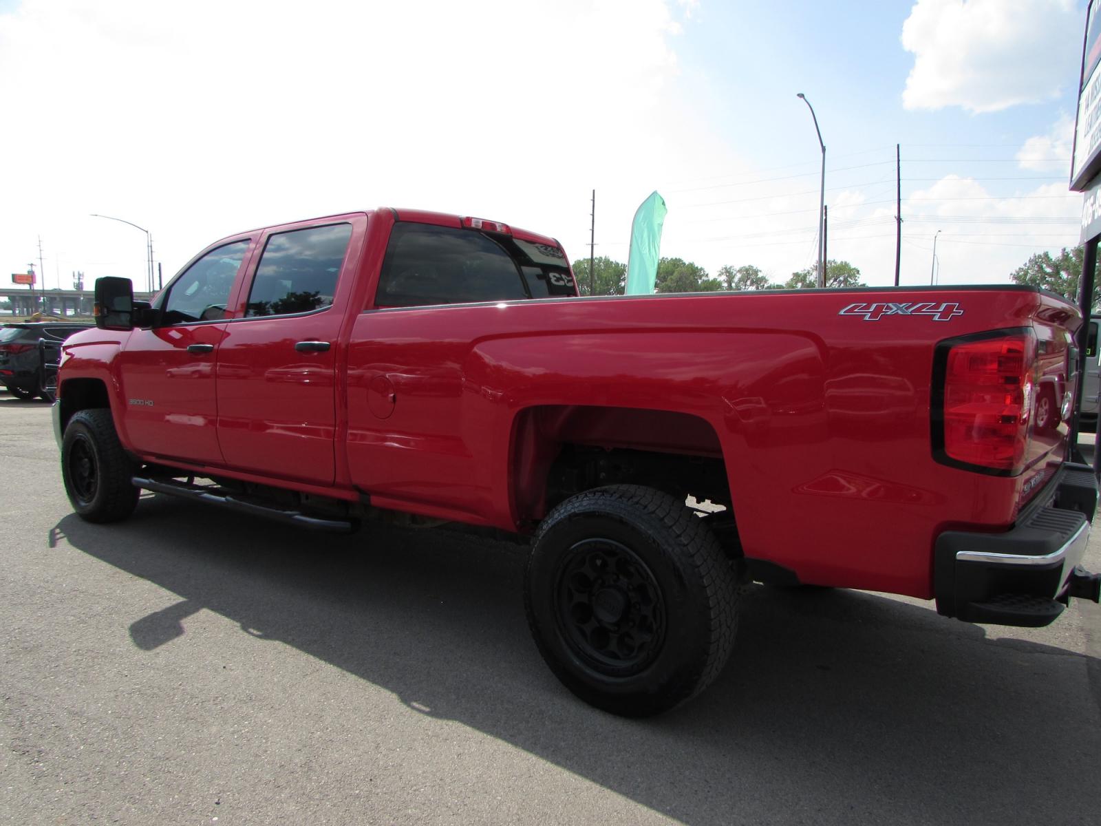 2017 Red /Gray Chevrolet Silverado 3500HD Work Truck Crew Cab Long Box 4WD (1GC4KYCG2HF) with an 6.0L V8 OHV 16V FFV engine, 6A transmission, located at 4562 State Avenue, Billings, MT, 59101, (406) 896-9833, 45.769516, -108.526772 - 2017 Chevrolet Silverado 3500HD Work Truck Crew Cab Long Box 4WD - One owner! 6.0L V8 OHV 16V engine - 6 speed automatic transmission - Longbox - 4WD - 100,888 miles - One owner! Work Truck package - air conditioning - tilt steering wheel - cruise control - touchscreen bluetooth audio - Chevr - Photo #1