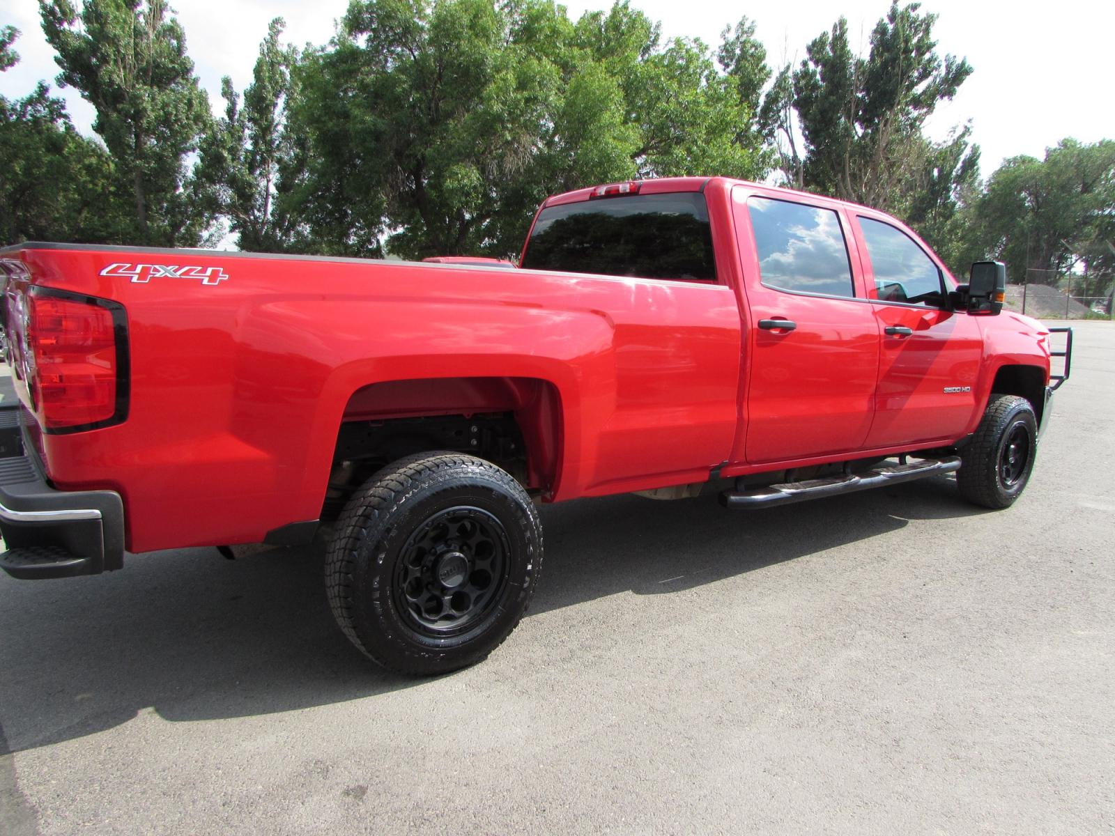 2017 Red /Gray Chevrolet Silverado 3500HD Work Truck Crew Cab Long Box 4WD (1GC4KYCG2HF) with an 6.0L V8 OHV 16V FFV engine, 6A transmission, located at 4562 State Avenue, Billings, MT, 59101, (406) 896-9833, 45.769516, -108.526772 - 2017 Chevrolet Silverado 3500HD Work Truck Crew Cab Long Box 4WD - One owner! 6.0L V8 OHV 16V engine - 6 speed automatic transmission - Longbox - 4WD - 100,888 miles - One owner! Work Truck package - air conditioning - tilt steering wheel - cruise control - touchscreen bluetooth audio - Chevr - Photo #3