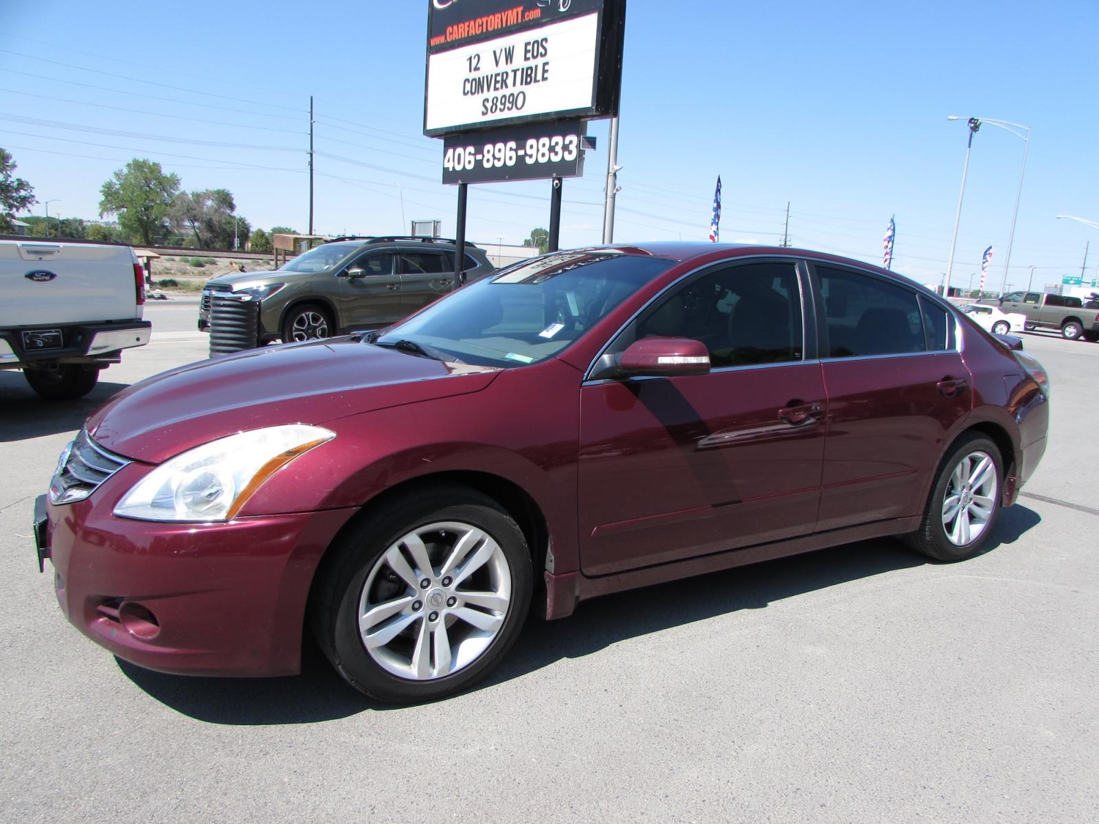 2011 Red /Tan Nissan Altima 3.5 SR (1N4BL2AP1BN) with an 3.5L V6 DOHC 24V engine, Continuously Variable Transmisson transmission, located at 4562 State Avenue, Billings, MT, 59101, (406) 896-9833, 45.769516, -108.526772 - 2011 Nissan Altima 3.5 SR - Leather/moonroof! 3.5L V6 DOHC 24V Engine - CVT automatic transmission - Front wheel drive - 125,051 miles - Inspected and serviced Inspected and serviced - copy of inspection and work performed as well as a complete history report provided! - SR package - clima - Photo #0