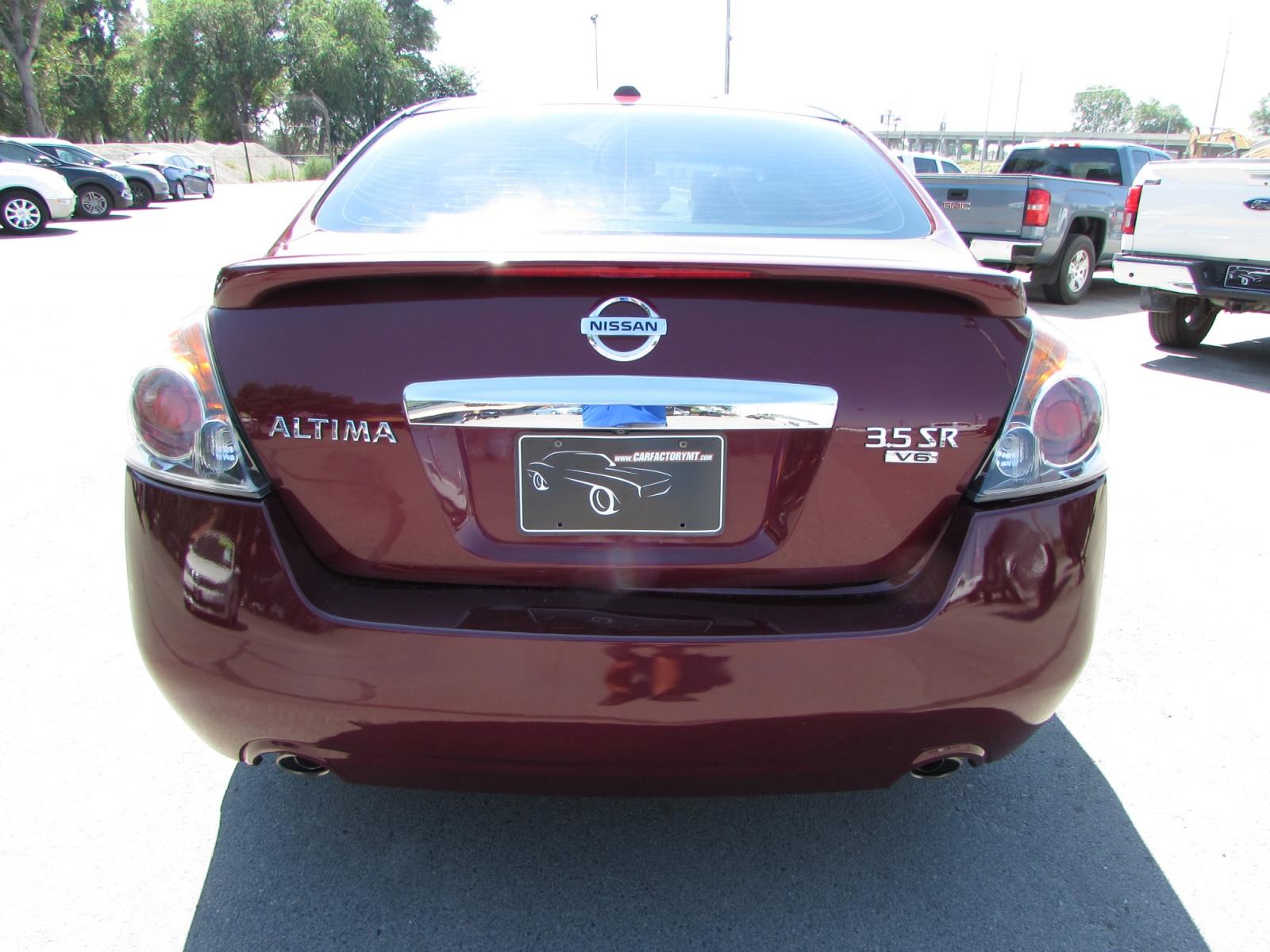2011 Red /Tan Nissan Altima 3.5 SR (1N4BL2AP1BN) with an 3.5L V6 DOHC 24V engine, Continuously Variable Transmisson transmission, located at 4562 State Avenue, Billings, MT, 59101, (406) 896-9833, 45.769516, -108.526772 - 2011 Nissan Altima 3.5 SR - Leather/moonroof! 3.5L V6 DOHC 24V Engine - CVT automatic transmission - Front wheel drive - 125,051 miles - Inspected and serviced Inspected and serviced - copy of inspection and work performed as well as a complete history report provided! - SR package - clima - Photo #2