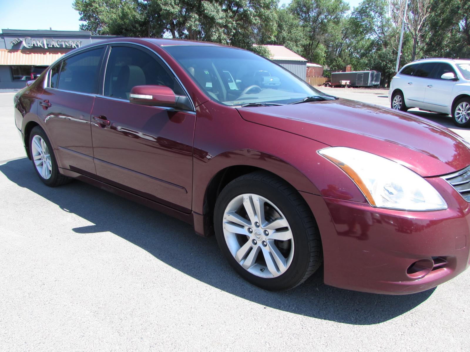 2011 Red /Tan Nissan Altima 3.5 SR (1N4BL2AP1BN) with an 3.5L V6 DOHC 24V engine, Continuously Variable Transmisson transmission, located at 4562 State Avenue, Billings, MT, 59101, (406) 896-9833, 45.769516, -108.526772 - 2011 Nissan Altima 3.5 SR - Leather/moonroof! 3.5L V6 DOHC 24V Engine - CVT automatic transmission - Front wheel drive - 125,051 miles - Inspected and serviced Inspected and serviced - copy of inspection and work performed as well as a complete history report provided! - SR package - clima - Photo #4