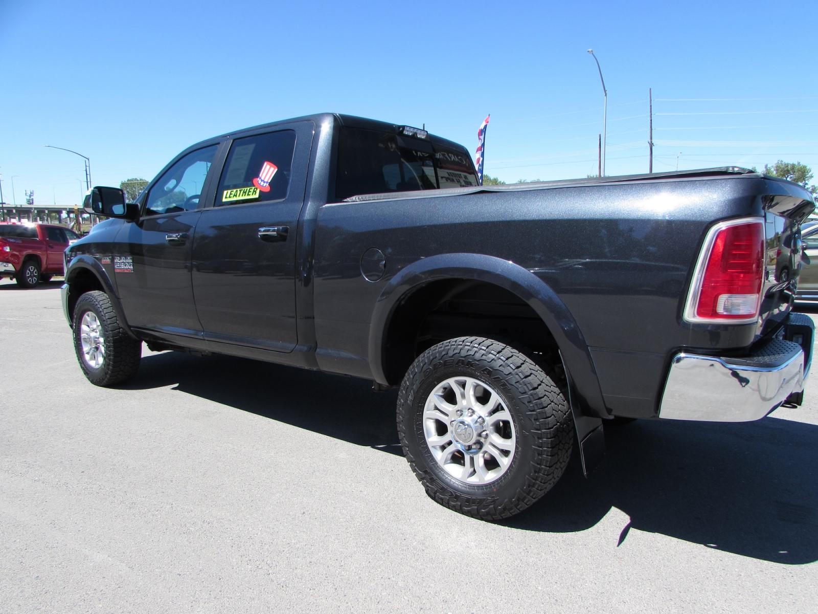 2016 Gray /Gray RAM 2500 Laramie Crew Cab SWB 4WD (3C6UR5FJ0GG) with an 6.4L V8 engine, 6A transmission, located at 4562 State Avenue, Billings, MT, 59101, (406) 896-9833, 45.769516, -108.526772 - 2016 RAM 2500 Laramie Crew Cab SWB 4WD - Montana unit! 6.4L V8 Engine - 6 speed automatic transmission - 4WD - 131,629 miles - Montana 2 owner unit Inspected and serviced - copy of inspection and work performed as well as a full vehicle history report provided! Laramie package - air conditi - Photo #1