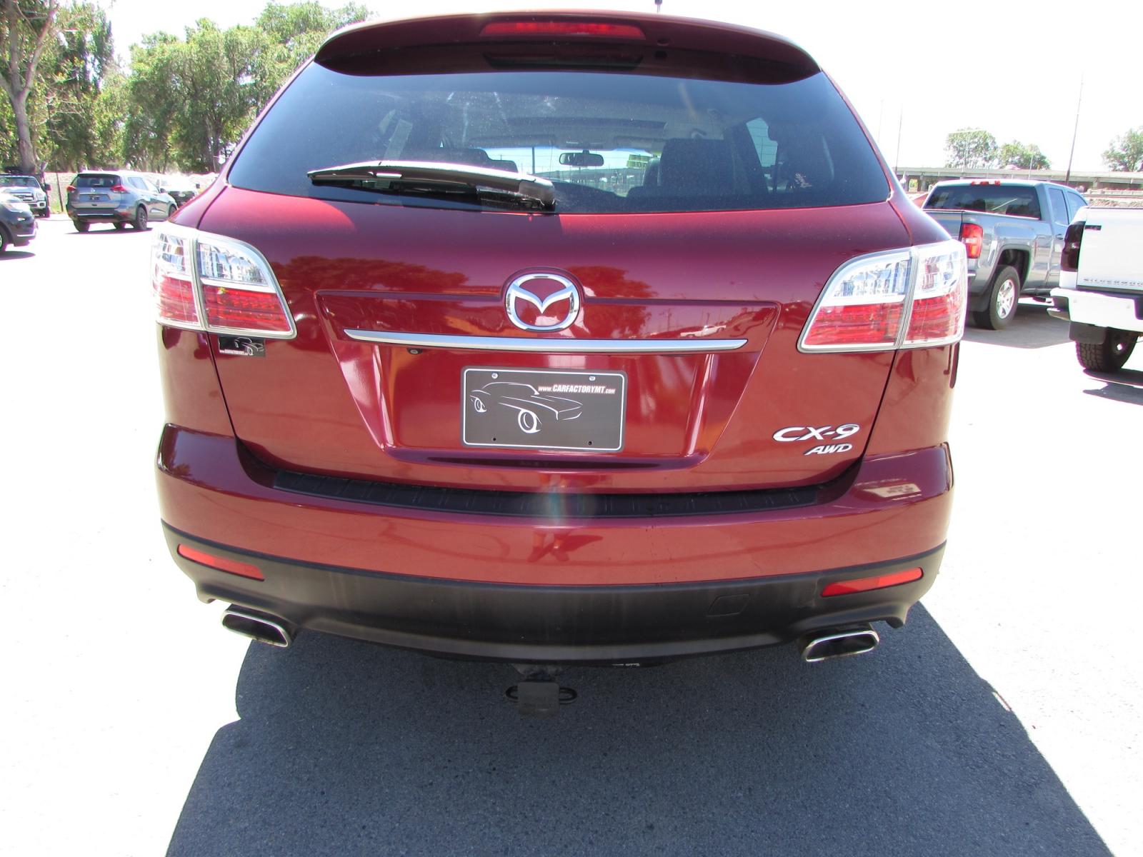 2011 Red /Gray Mazda CX-9 Touring AWD (JM3TB3CVXB0) with an 3.7L V6 DOHC 24V engine, 6-Speed Automatic transmission, located at 4562 State Avenue, Billings, MT, 59101, (406) 896-9833, 45.769516, -108.526772 - 2011 Mazda CX-9 Touring AWD - Moonroof - 3rd row seating! 3.7L V6 DOHC 24V engine - 6 speed automatic transmission - AWD - 106,244 miles Touring package - air conditioning - tilt wheel - cruise control - Bose touchscreen audio system with Bluetooth - power windows and door locks - power sunroo - Photo #2