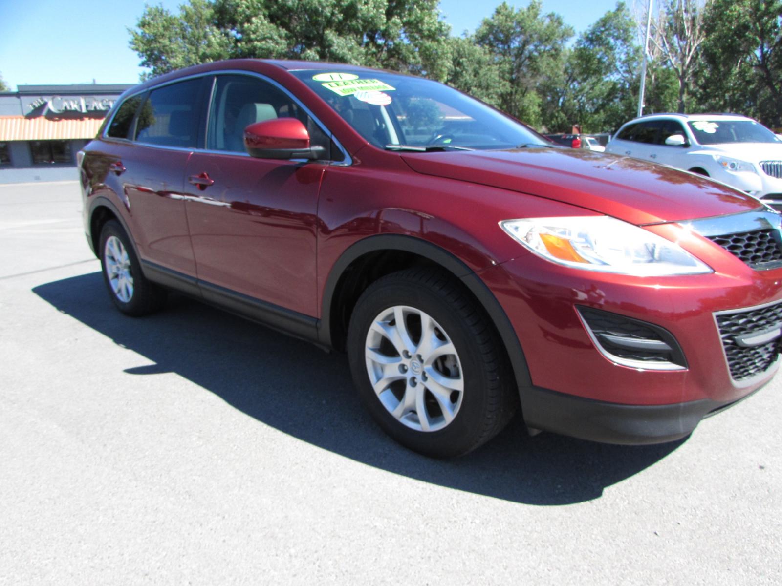 2011 Red /Gray Mazda CX-9 Touring AWD (JM3TB3CVXB0) with an 3.7L V6 DOHC 24V engine, 6-Speed Automatic transmission, located at 4562 State Avenue, Billings, MT, 59101, (406) 896-9833, 45.769516, -108.526772 - 2011 Mazda CX-9 Touring AWD - Moonroof - 3rd row seating! 3.7L V6 DOHC 24V engine - 6 speed automatic transmission - AWD - 106,244 miles Touring package - air conditioning - tilt wheel - cruise control - Bose touchscreen audio system with Bluetooth - power windows and door locks - power sunroo - Photo #4