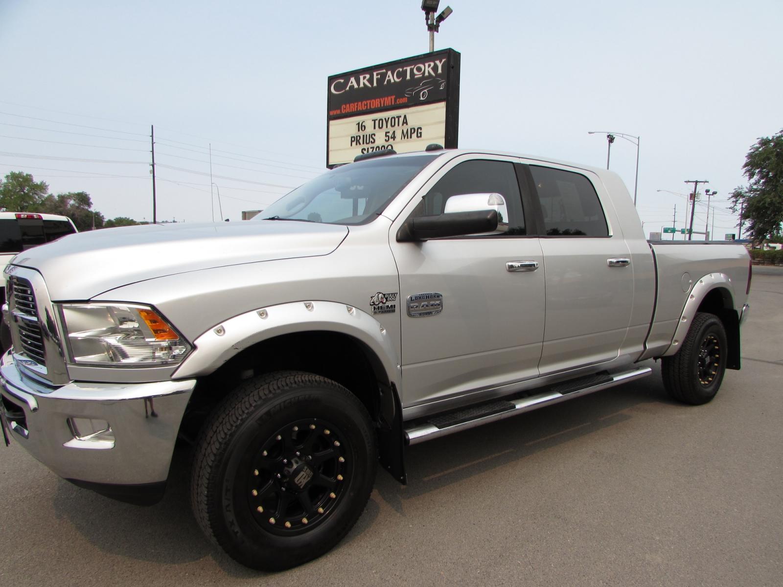 2012 Silver /Saddle leather Dodge Ram 2500 Laramie Longhorn Edition Mega Cab SWB 4WD (3C6TD5PT6CG) with an 5.7L V8 OHV 16V engine, 6-Speed Automatic transmission, located at 4562 State Avenue, Billings, MT, 59101, (406) 896-9833, 45.769516, -108.526772 - 2012 Dodge Ram 2500 Laramie Longhorn Edition Mega Cab SWB 4WD 5.7L V8 OHV 16V Engine - 6 speed automatic transmission - 4WD - 171,812 miles Longhorn Edition - climate control - air conditioning - tilt wheel - cruise control - Alpine touchscreen audio with bluetooth - U Connect to pair your dev - Photo #0