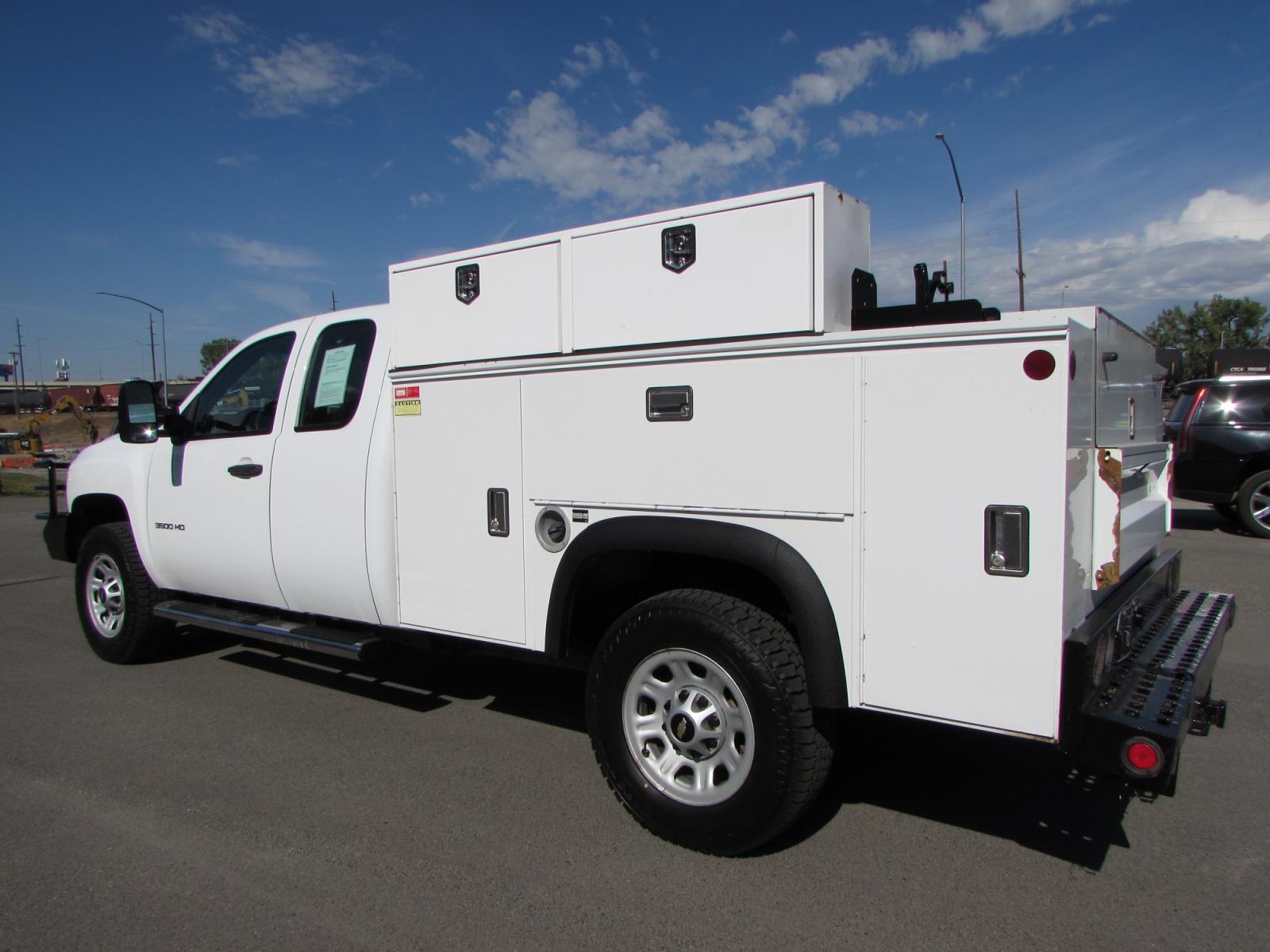 2013 White /Gray Chevrolet Silverado 3500HD Work Truck Ext. Cab Long Box 4WD (1GB5KZCG9DZ) with an 6.0L V8 OHV 16V FFV engine, 6-Speed Automatic transmission, located at 4562 State Avenue, Billings, MT, 59101, (406) 896-9833, 45.769516, -108.526772 - 2013 Chevrolet Silverado 3500HD Ext. Cab 4WD Service Truck - Very clean - Low miles! 6.0L V8 OHV 16V FFV Gasoline Engine - 6-Speed Automatic Transmission - 4WD - 103,694 miles - Inspected and serviced Copy of inspection and work performed as well as full history report provided Book value - - Photo #1