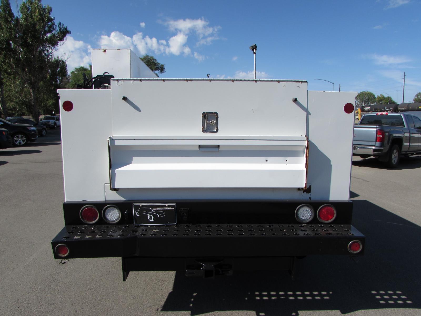2013 White /Gray Chevrolet Silverado 3500HD Work Truck Ext. Cab Long Box 4WD (1GB5KZCG9DZ) with an 6.0L V8 OHV 16V FFV engine, 6-Speed Automatic transmission, located at 4562 State Avenue, Billings, MT, 59101, (406) 896-9833, 45.769516, -108.526772 - 2013 Chevrolet Silverado 3500HD Ext. Cab 4WD Service Truck - Very clean - Low miles! 6.0L V8 OHV 16V FFV Gasoline Engine - 6-Speed Automatic Transmission - 4WD - 103,694 miles - Inspected and serviced Copy of inspection and work performed as well as full history report provided Book value - - Photo #2