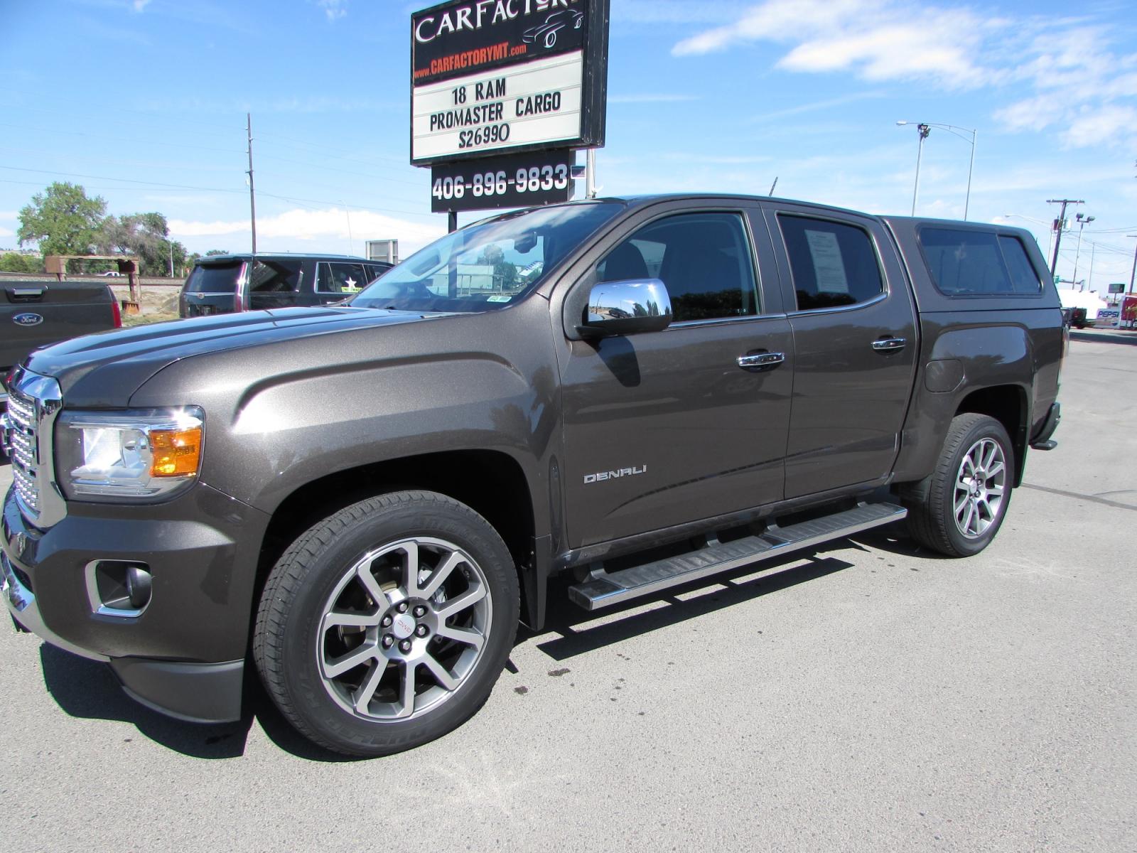 2019 Smokey Quartz Metallic /Gray Leather GMC Canyon Denali Crew Cab 4WD Long Box (1GTG6EEN6K1) with an 3.6L V6 DOHC 24V engine, 8A transmission, located at 4562 State Avenue, Billings, MT, 59101, (406) 896-9833, 45.769516, -108.526772 - 2019 GMC Canyon Denali Crew Cab 4WD - 32,000 miles! 3.6L V6 DOHC 24V engine - 8 speed automatic transmission - 4WD - 32,313 miles Denali package - climate control - dual zone air conditioning - tilt wheel - cruise control - Bose touchscreen audio with navigation and bluetooth - hands free phon - Photo #0