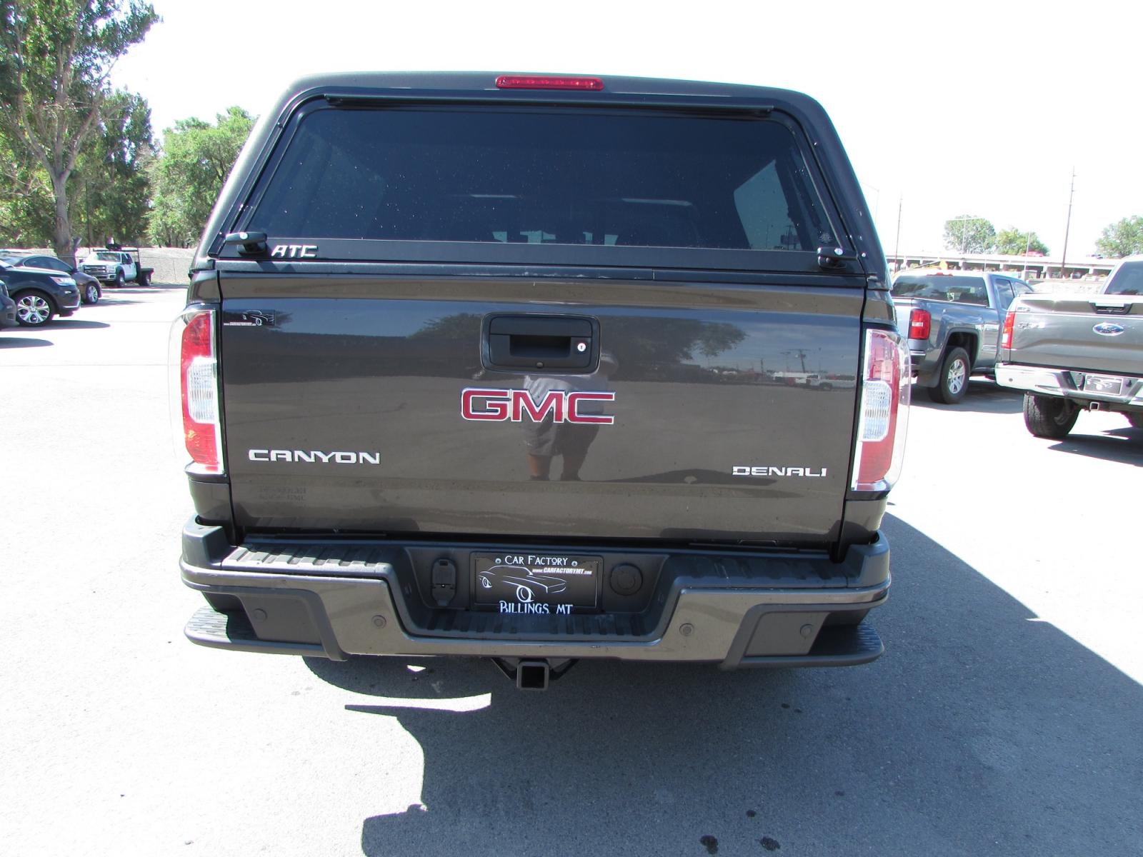 2019 Smokey Quartz Metallic /Gray Leather GMC Canyon Denali Crew Cab 4WD Long Box (1GTG6EEN6K1) with an 3.6L V6 DOHC 24V engine, 8A transmission, located at 4562 State Avenue, Billings, MT, 59101, (406) 896-9833, 45.769516, -108.526772 - 2019 GMC Canyon Denali Crew Cab 4WD - 32,000 miles! 3.6L V6 DOHC 24V engine - 8 speed automatic transmission - 4WD - 32,313 miles Denali package - climate control - dual zone air conditioning - tilt wheel - cruise control - Bose touchscreen audio with navigation and bluetooth - hands free phon - Photo #2