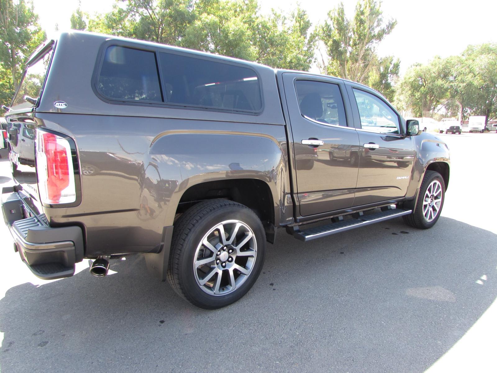 2019 Smokey Quartz Metallic /Gray Leather GMC Canyon Denali Crew Cab 4WD Long Box (1GTG6EEN6K1) with an 3.6L V6 DOHC 24V engine, 8A transmission, located at 4562 State Avenue, Billings, MT, 59101, (406) 896-9833, 45.769516, -108.526772 - 2019 GMC Canyon Denali Crew Cab 4WD - 32,000 miles! 3.6L V6 DOHC 24V engine - 8 speed automatic transmission - 4WD - 32,313 miles Denali package - climate control - dual zone air conditioning - tilt wheel - cruise control - Bose touchscreen audio with navigation and bluetooth - hands free phon - Photo #3