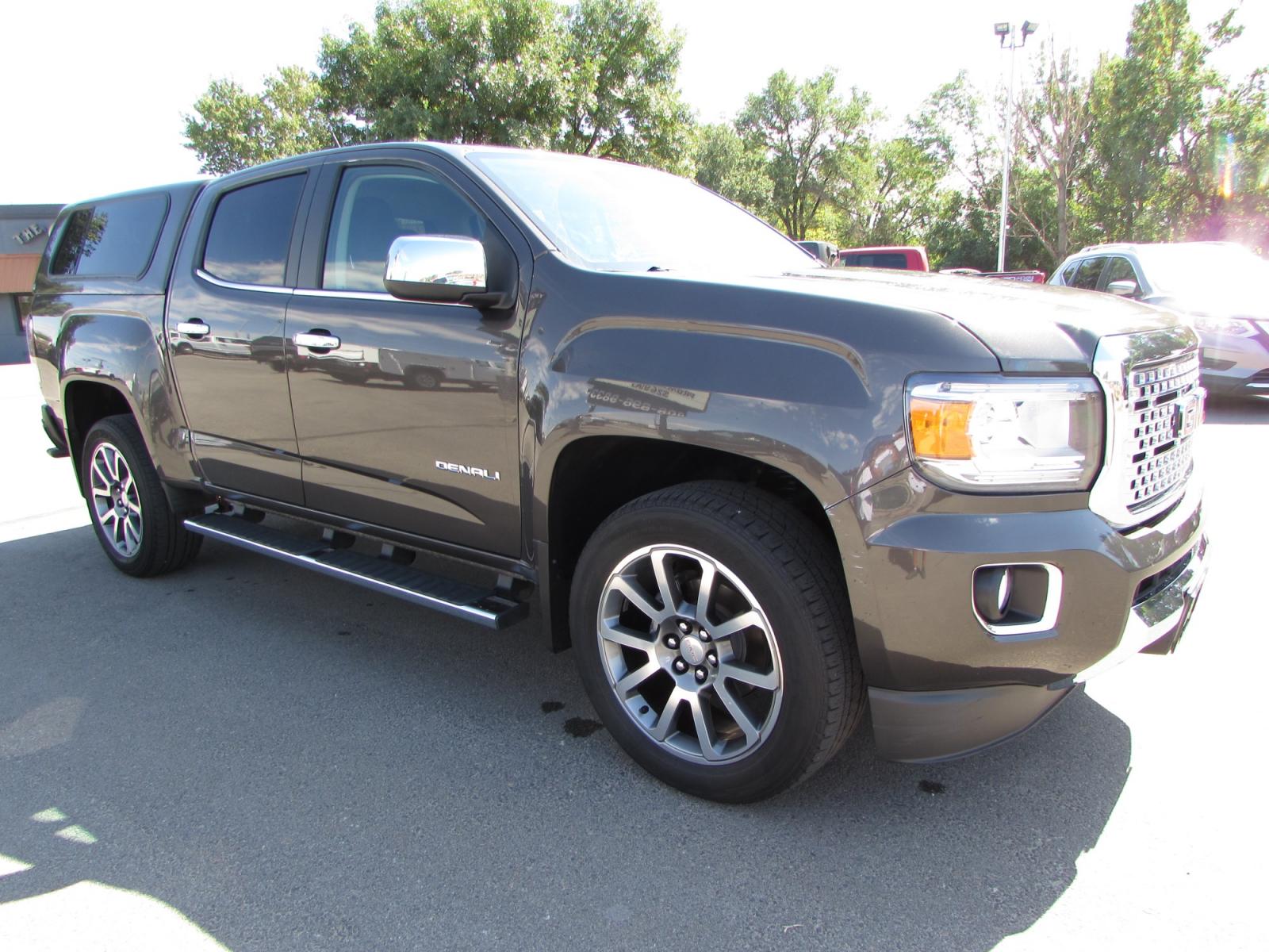 2019 Smokey Quartz Metallic /Gray Leather GMC Canyon Denali Crew Cab 4WD Long Box (1GTG6EEN6K1) with an 3.6L V6 DOHC 24V engine, 8A transmission, located at 4562 State Avenue, Billings, MT, 59101, (406) 896-9833, 45.769516, -108.526772 - 2019 GMC Canyon Denali Crew Cab 4WD - 32,000 miles! 3.6L V6 DOHC 24V engine - 8 speed automatic transmission - 4WD - 32,313 miles Denali package - climate control - dual zone air conditioning - tilt wheel - cruise control - Bose touchscreen audio with navigation and bluetooth - hands free phon - Photo #4