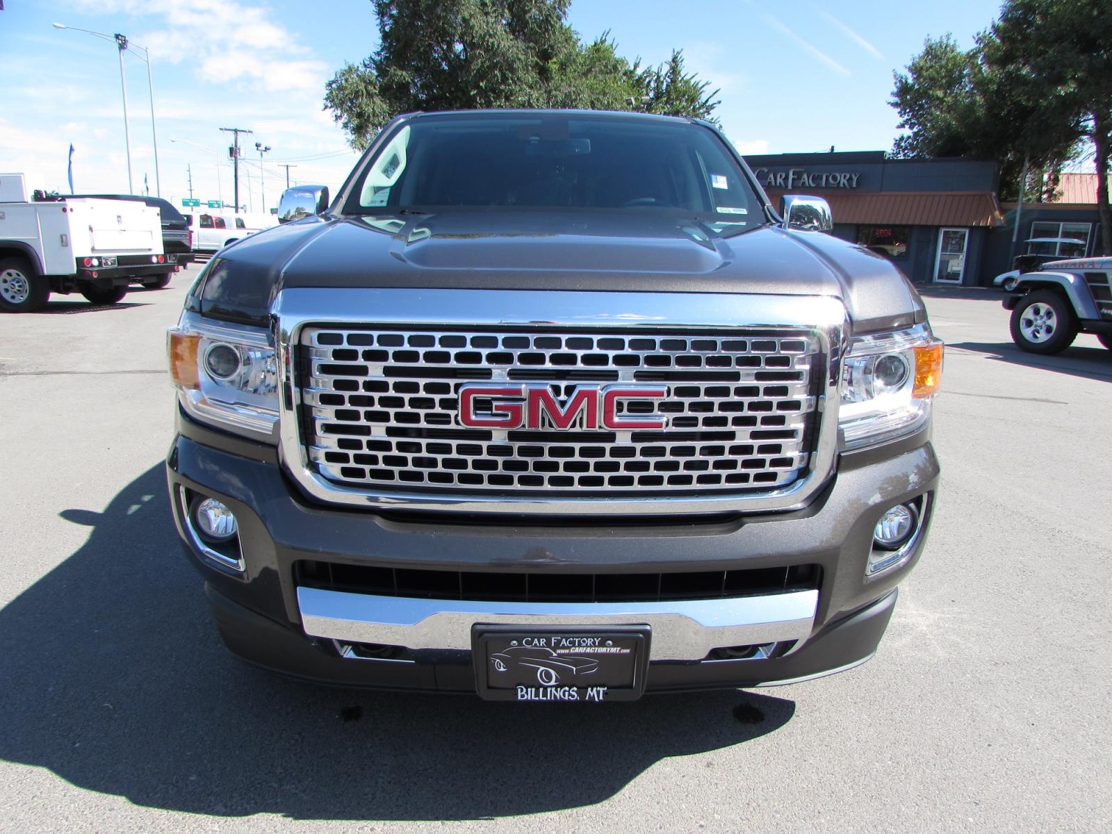2019 Smokey Quartz Metallic /Gray Leather GMC Canyon Denali Crew Cab 4WD Long Box (1GTG6EEN6K1) with an 3.6L V6 DOHC 24V engine, 8A transmission, located at 4562 State Avenue, Billings, MT, 59101, (406) 896-9833, 45.769516, -108.526772 - 2019 GMC Canyon Denali Crew Cab 4WD - 32,000 miles! 3.6L V6 DOHC 24V engine - 8 speed automatic transmission - 4WD - 32,313 miles Denali package - climate control - dual zone air conditioning - tilt wheel - cruise control - Bose touchscreen audio with navigation and bluetooth - hands free phon - Photo #5