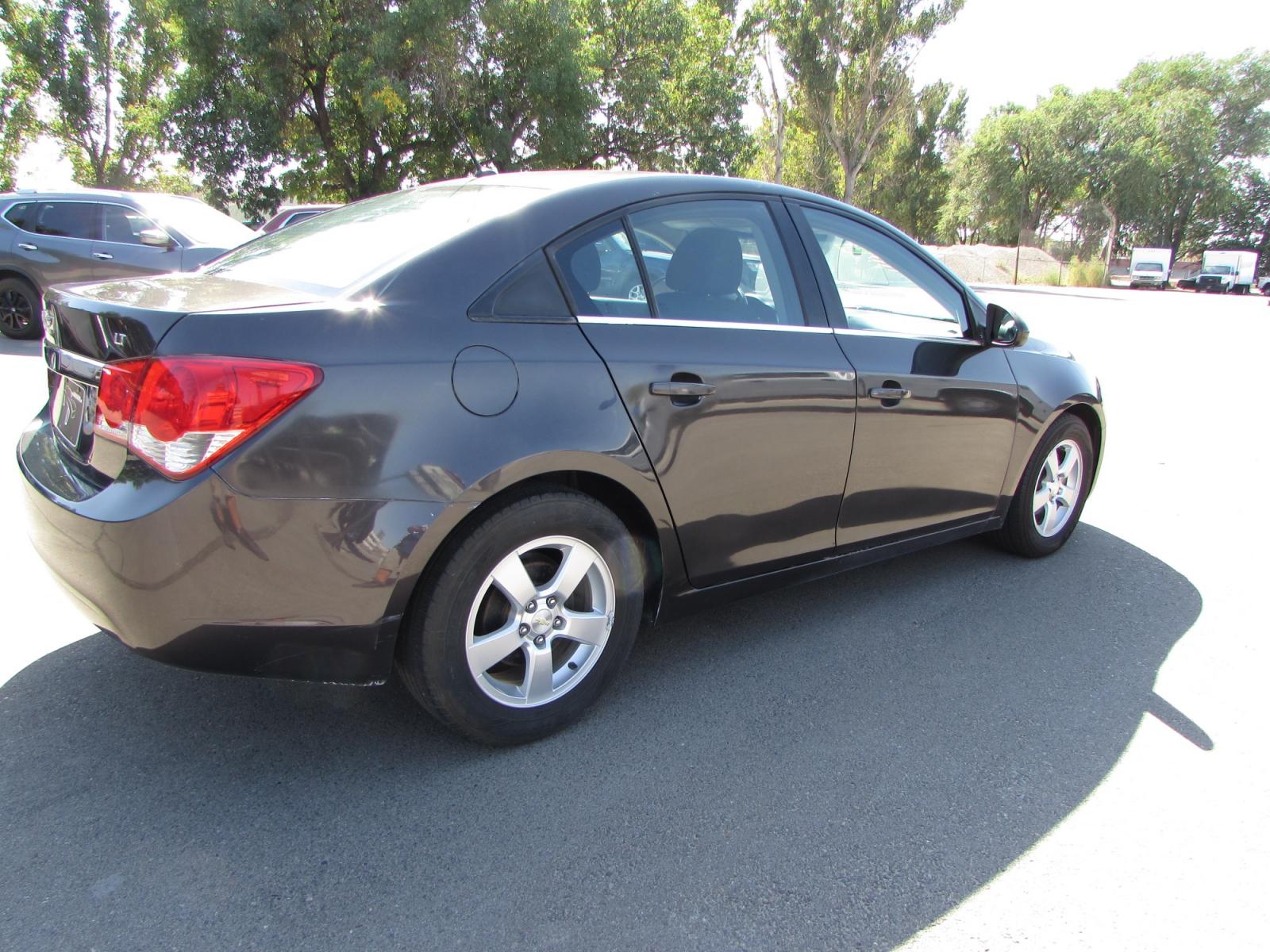 2014 Gray /Gray Chevrolet Cruze LT (1G1PK5SB9E7) with an 1.4L L4 DOHC 16V TURBO FFV engine, 6-Speed Manual transmission, located at 4562 State Avenue, Billings, MT, 59101, (406) 896-9833, 45.769516, -108.526772 - 2014 Chevrolet Cruze LT Sedan - 57,000 miles! 1.4L L4 DOHC 16V TURBO Engine - 6 speed automatic transmission - Front wheel drive - 57,810 miles LT package - air conditioning - tilt and telescoping steering wheel - cruise control - touchscreen AM/FM/CD audio - enhanced acoustic package - power - Photo #14