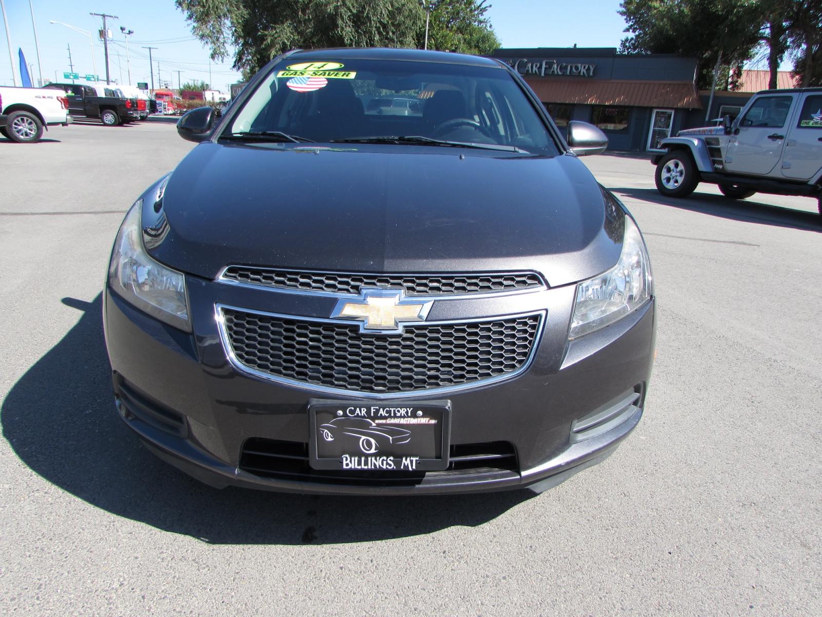 2014 Gray /Gray Chevrolet Cruze LT (1G1PK5SB9E7) with an 1.4L L4 DOHC 16V TURBO FFV engine, 6-Speed Manual transmission, located at 4562 State Avenue, Billings, MT, 59101, (406) 896-9833, 45.769516, -108.526772 - 2014 Chevrolet Cruze LT Sedan - 57,000 miles! 1.4L L4 DOHC 16V TURBO Engine - 6 speed automatic transmission - Front wheel drive - 57,810 miles LT package - air conditioning - tilt and telescoping steering wheel - cruise control - touchscreen AM/FM/CD audio - enhanced acoustic package - power - Photo #15